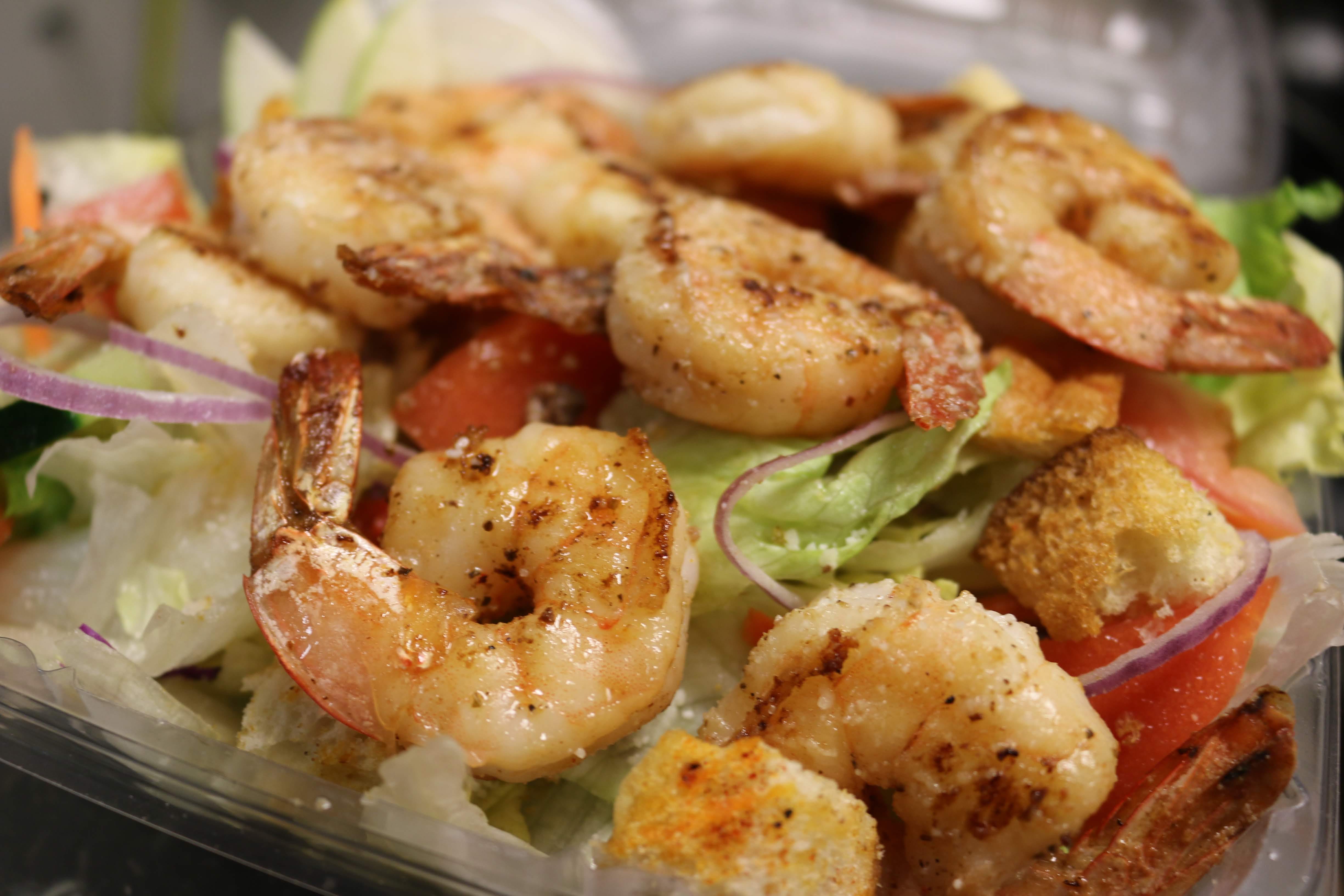 Order Caesar Salad with Grilled Shrimp - Large food online from Abington Pizza store, Glenside on bringmethat.com