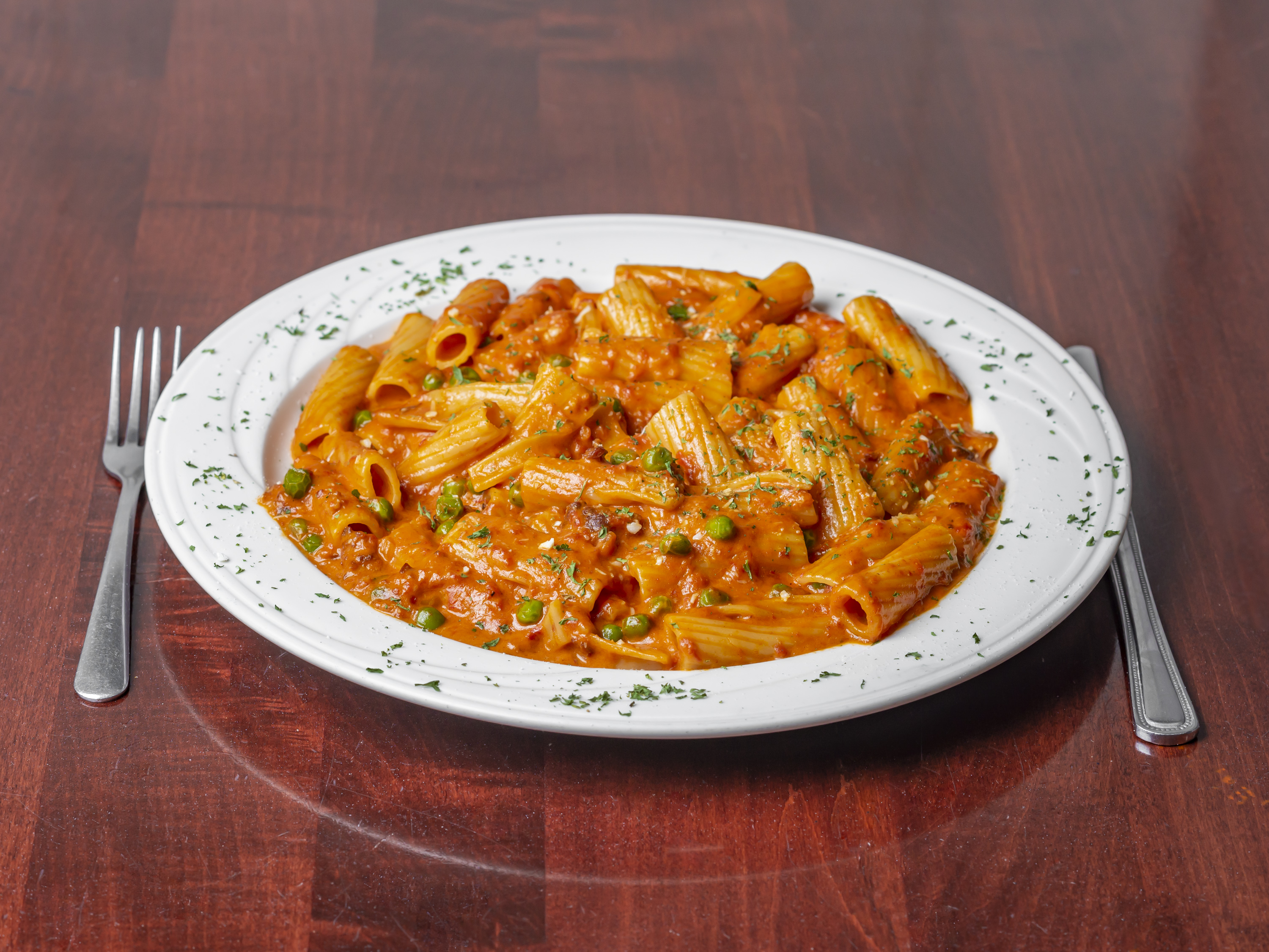 Order Rigatoni Con Vodka Sauce Specialty food online from Vinny & Son Pizzeria & Italian Restaurant store, Lake Hopatcong on bringmethat.com