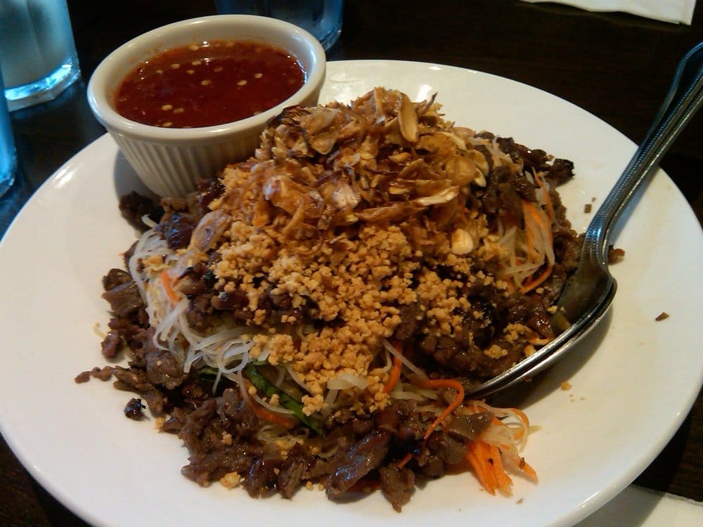 Order 18. Papaya Salad with Charbroiled Beef food online from Perilla store, San Francisco on bringmethat.com