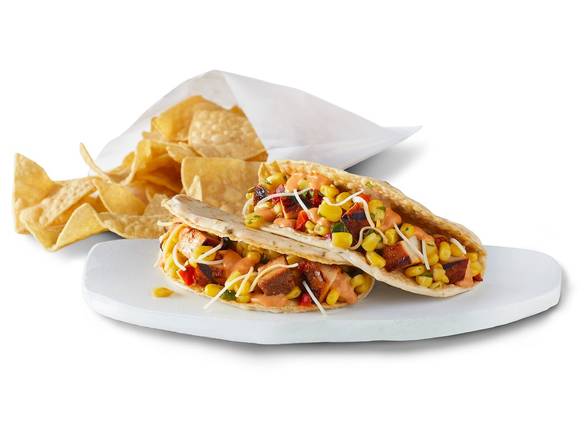 Order NEW 2 Queso-Crunch Chicken Tacos food online from Qdoba Mexican Eats store, Shelby Township on bringmethat.com