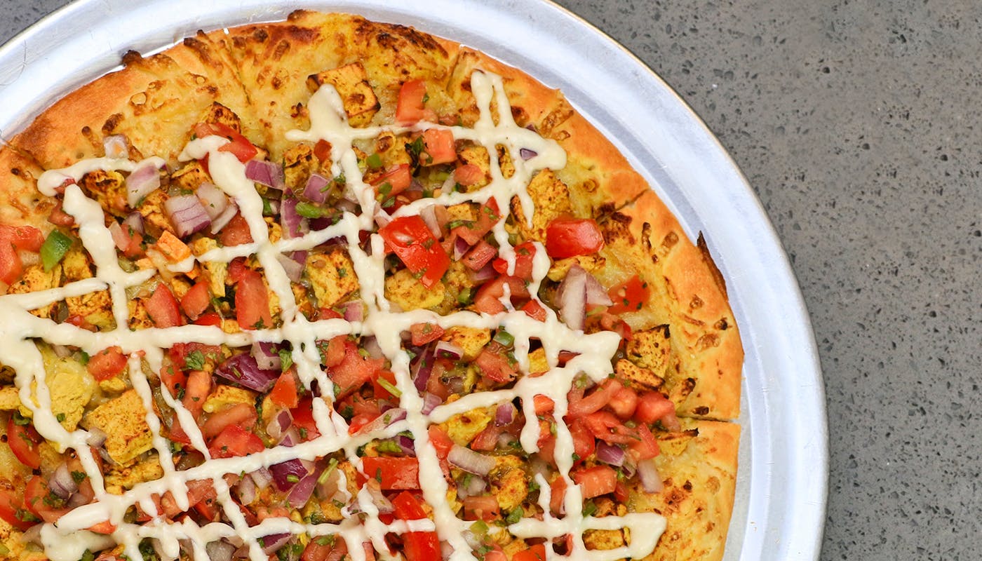 Order Curry Chicken Pizza(Plant Based) - Personal 7" food online from Pizzeria Halt store, Modesto on bringmethat.com