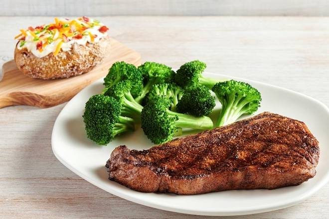 Order Bone-In New York Strip* 16 oz. food online from Outback Steakhouse store, Victorville on bringmethat.com