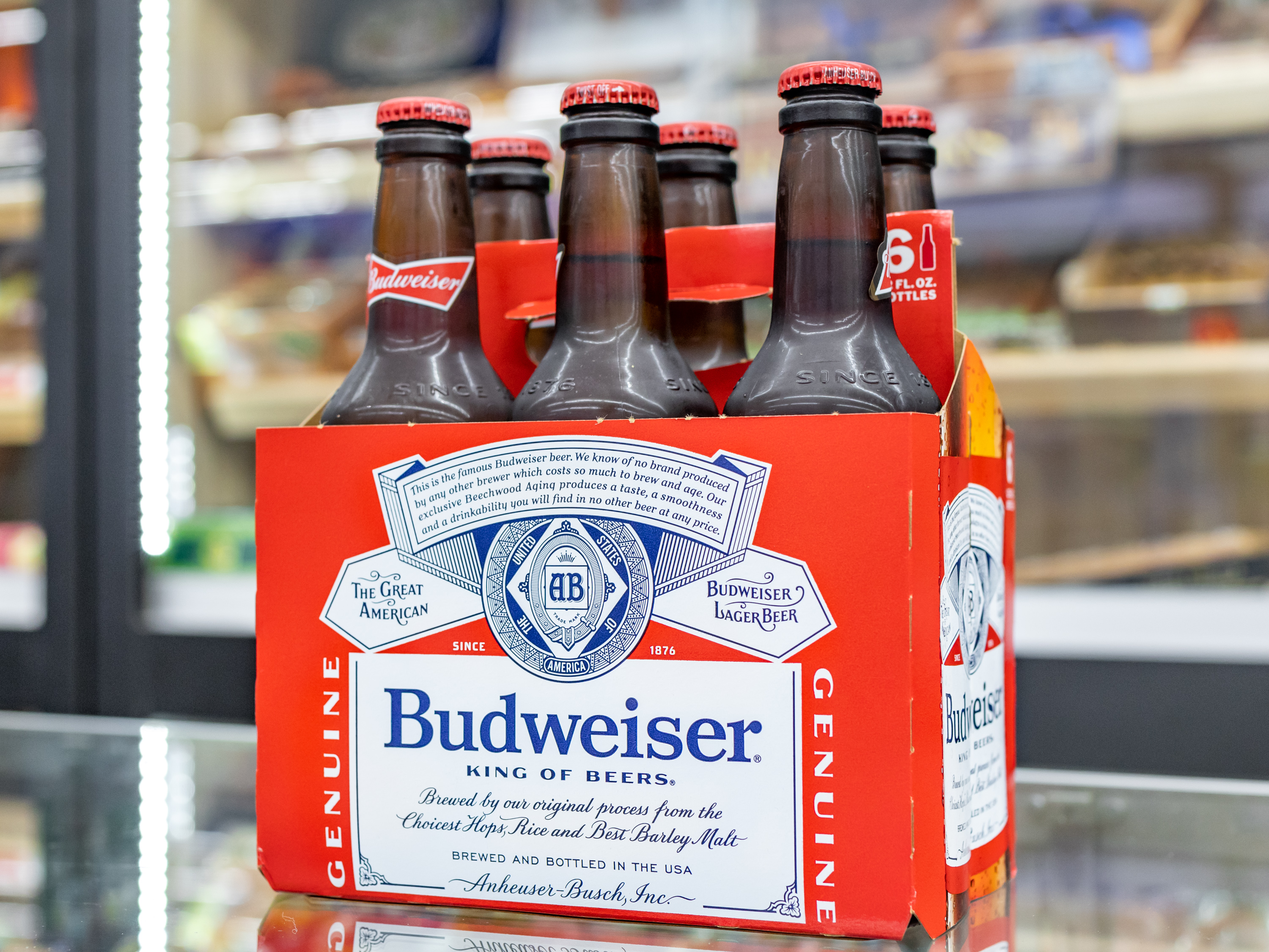 Order 12 oz. 6 Pack Bottled Budweiser  food online from Beer & Smoke Shop store, Nesconset on bringmethat.com
