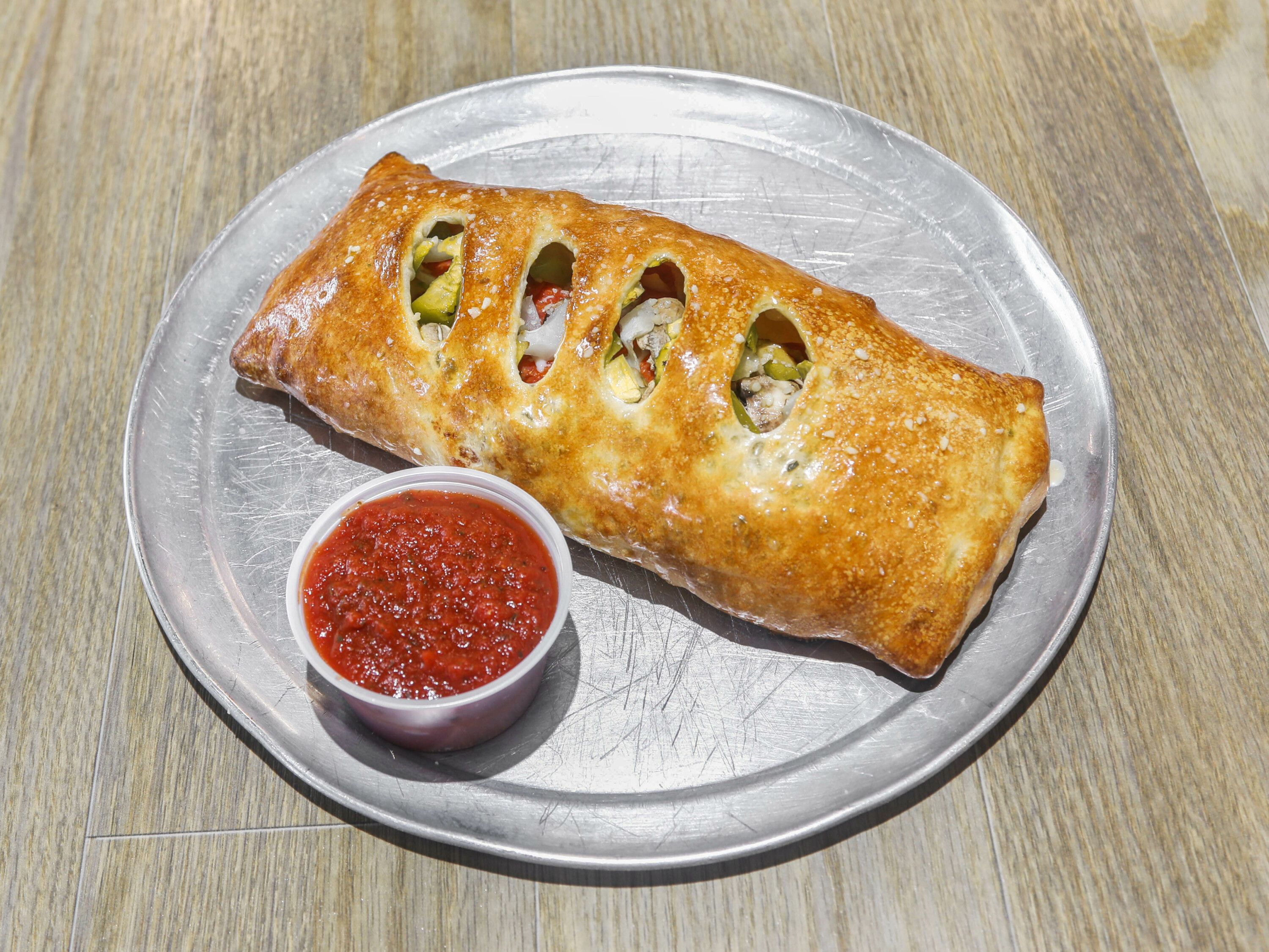 Order Philly Stromboli food online from Milania's NY Pizza store, Adairsville on bringmethat.com