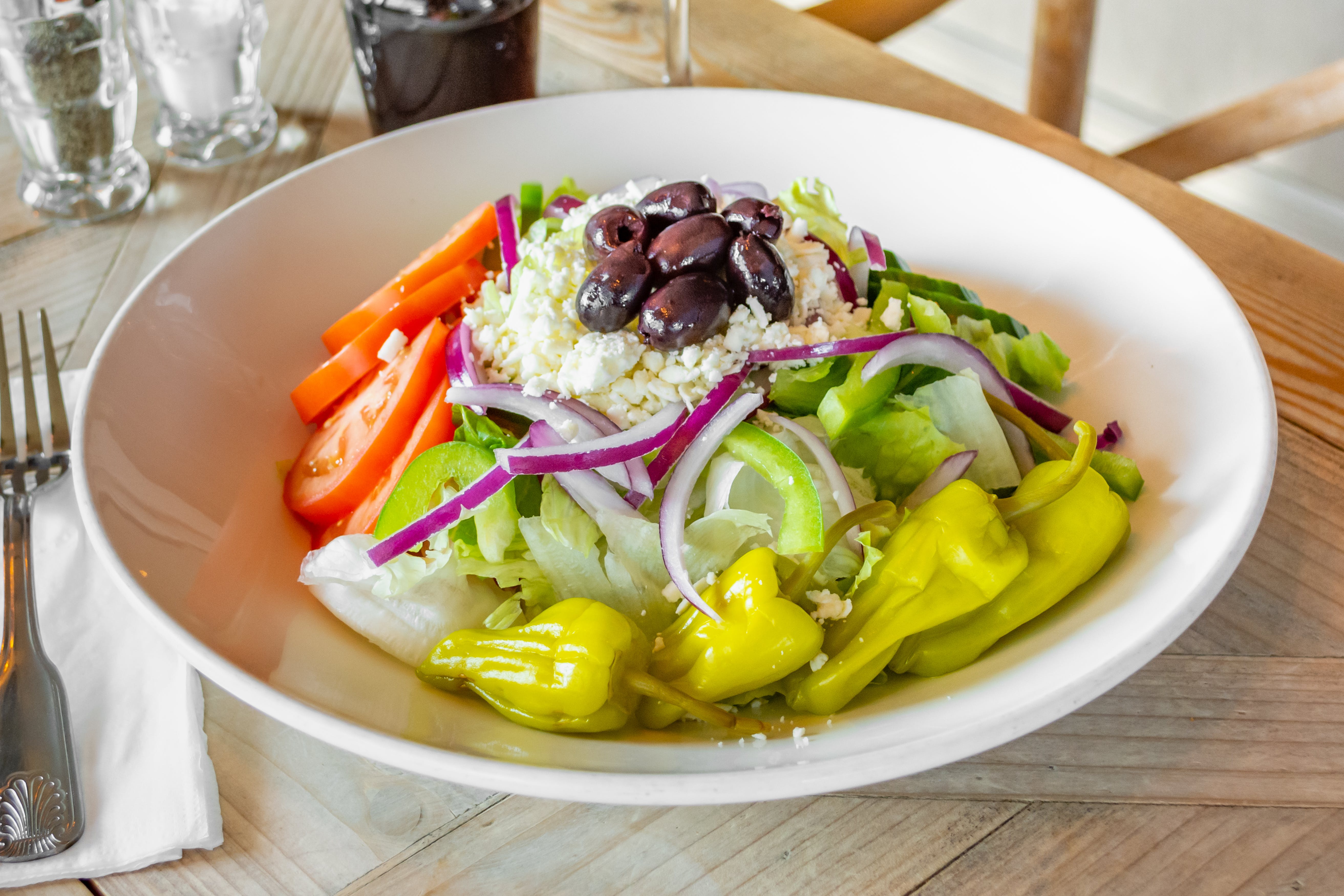 Order Greek Salad - Salad food online from Acropolis Pizza & Pasta store, Everett on bringmethat.com