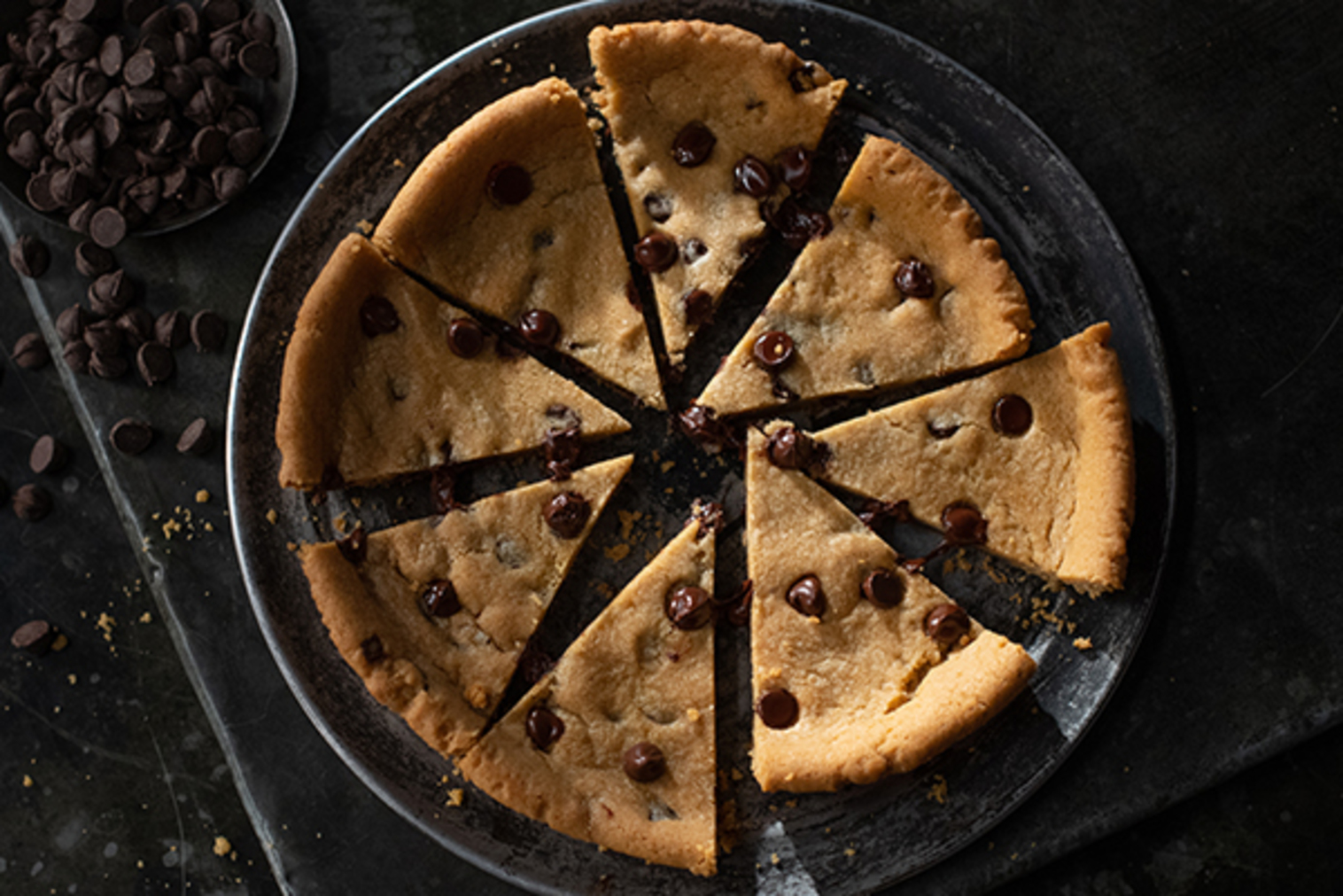 Order 8” Chocolate Chip Cookie food online from Jet Pizza store, Keego Harbor on bringmethat.com