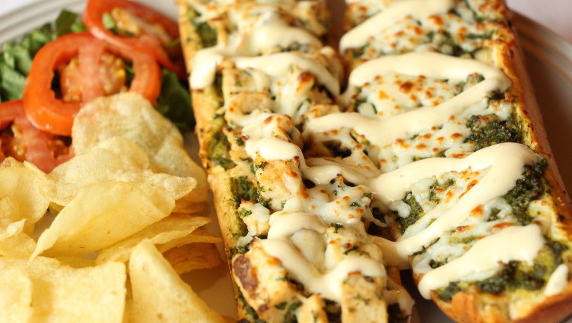 Order Chicken Pesto Sandwich - Sandwich food online from Palios Pizza Cafe store, Colleyville on bringmethat.com