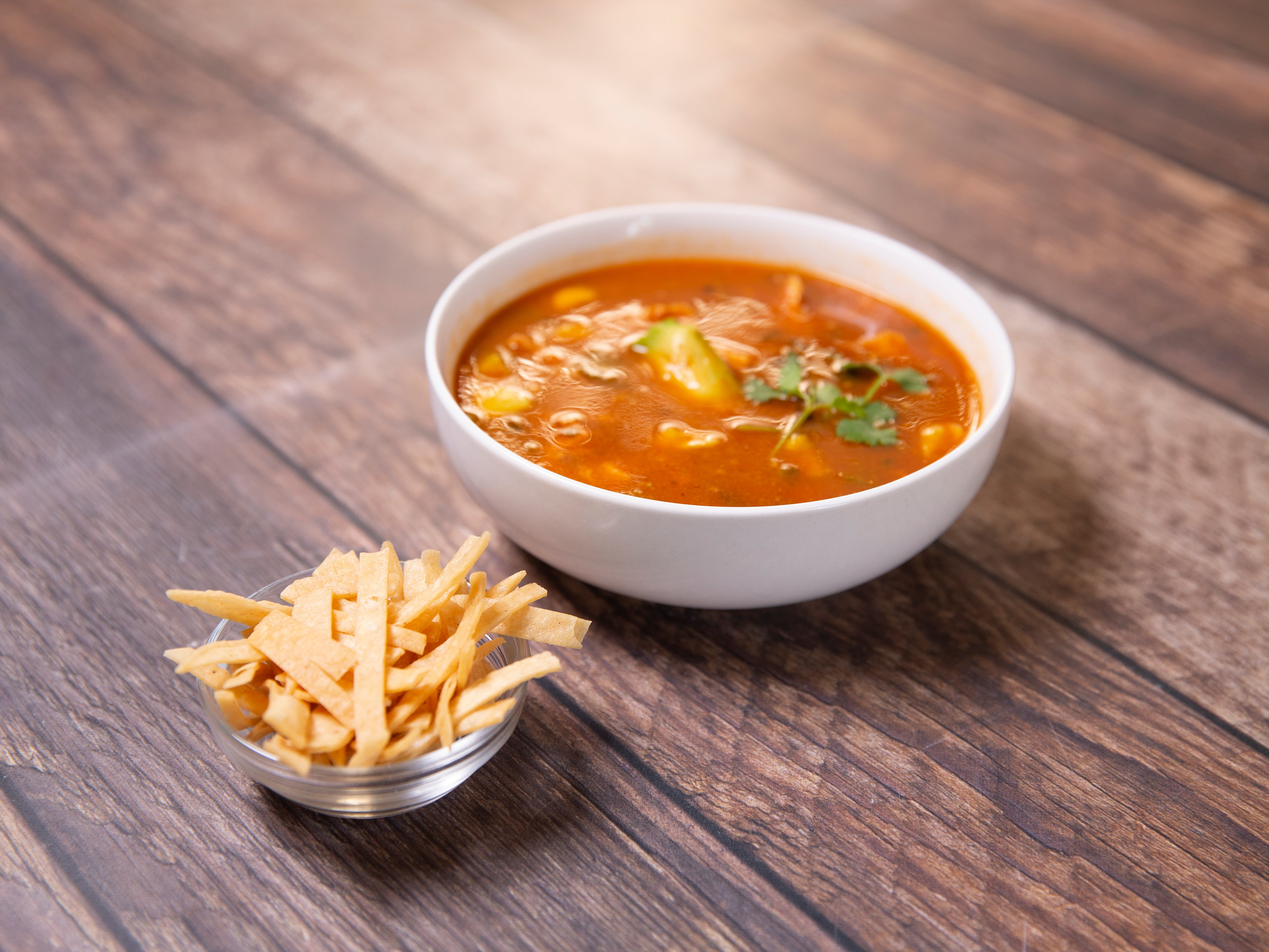 Order Tortilla Soup-Bowl food online from El Cholo Downtown store, Los Angeles on bringmethat.com