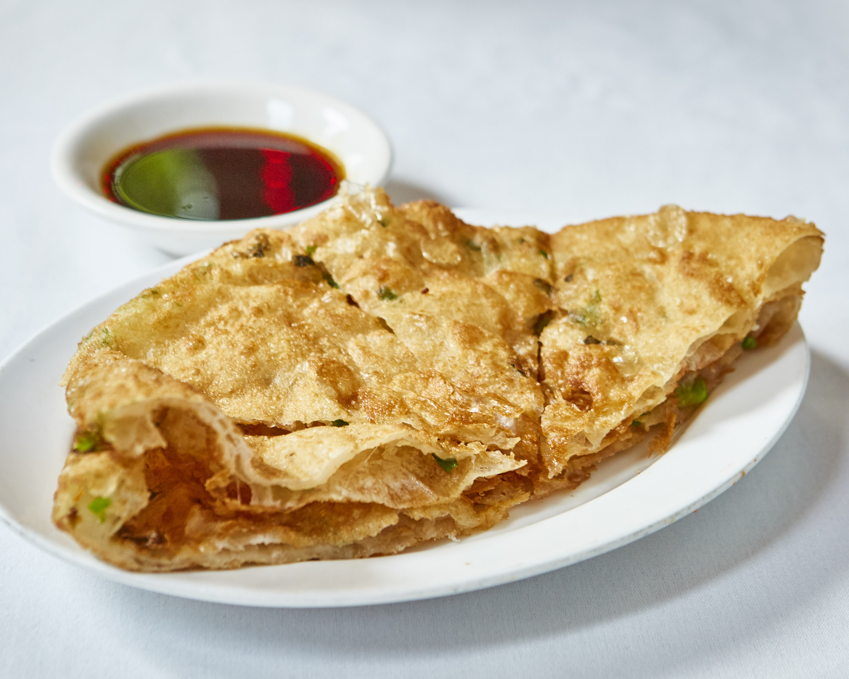 Order A5. Scallion Pancake food online from Ollie's Noodle Shop & Grille store, New York on bringmethat.com