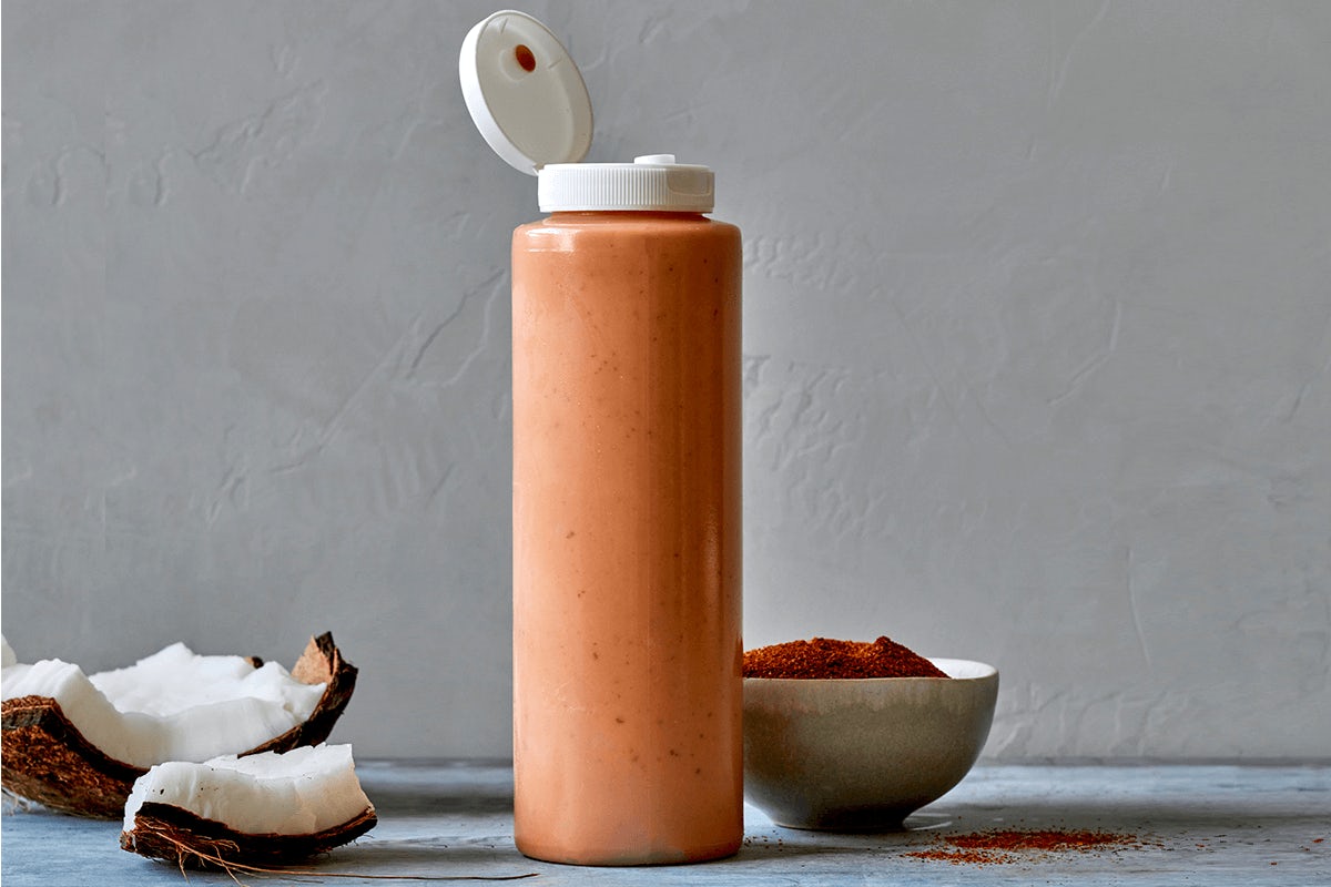Order Red Coconut Curry Sauce (bottle) food online from Honeygrow store, Pittsburgh on bringmethat.com