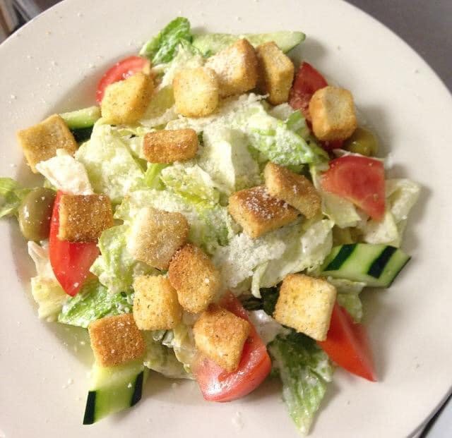 Order Caesar Salad - Salad food online from Linda's Pizza store, Ocean Gate on bringmethat.com