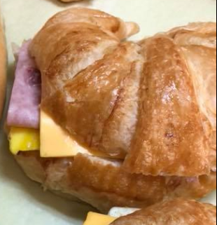 Order Croissant Ham Egg and Cheese food online from Happy D Donuts store, Houston on bringmethat.com