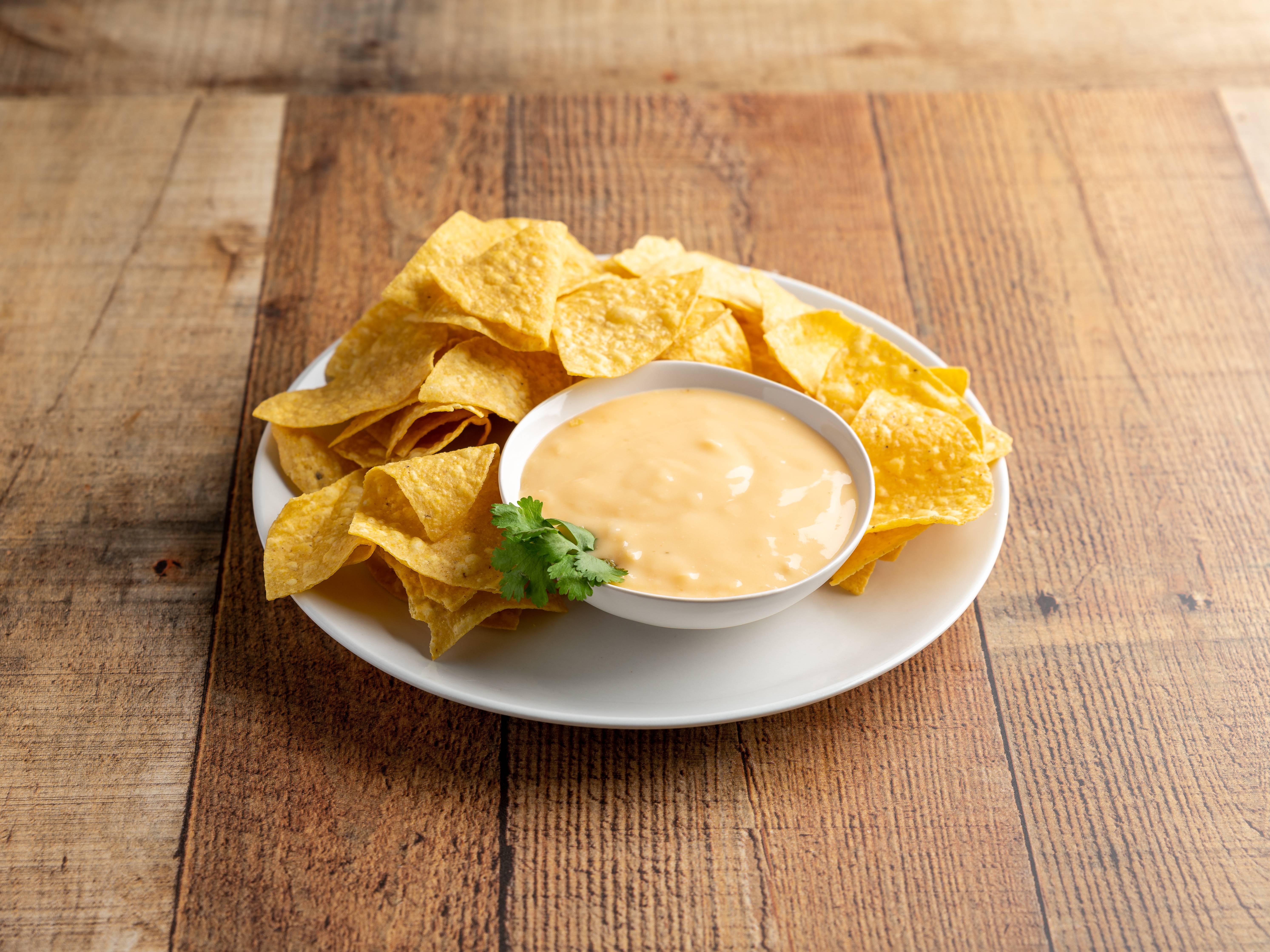 Order Cheese Sauce and Bag of Chips food online from Zapata Mexican Grill store, Oklahoma City on bringmethat.com