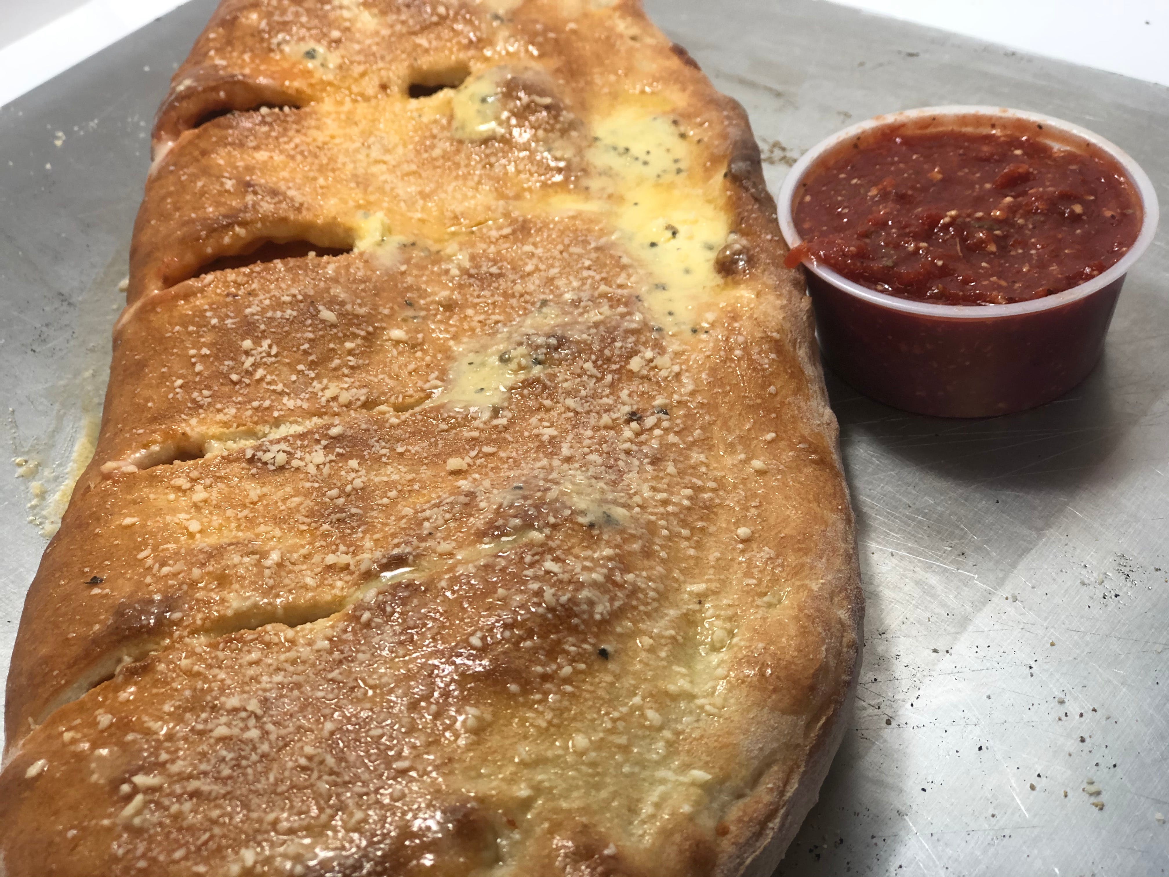 Order Stromboli - Small food online from Lombardo Pizza store, Wyoming on bringmethat.com