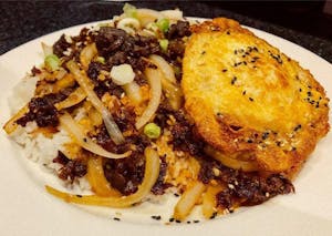 Order 129. Bulgogi Over Rice 韩国烤肉盖饭 food online from Jade Garden store, Lawrence on bringmethat.com