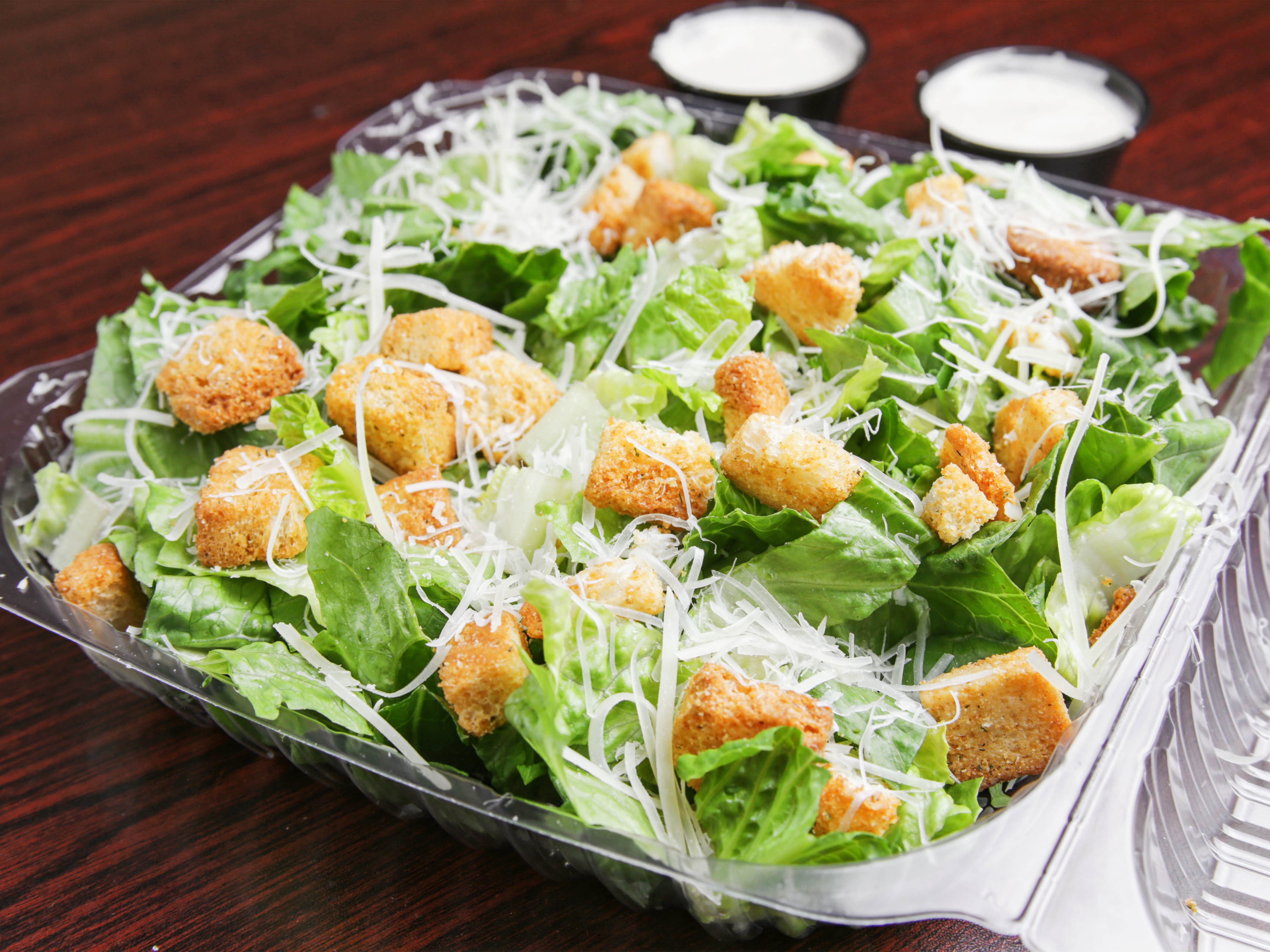 Order Caesar Salad food online from Rino D's Pizza & Wings store, Gilbert on bringmethat.com
