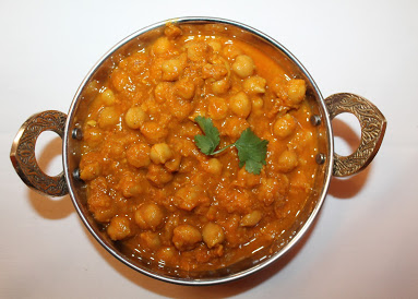 Order Chana Masala food online from Raaga Tandoor store, Burke on bringmethat.com