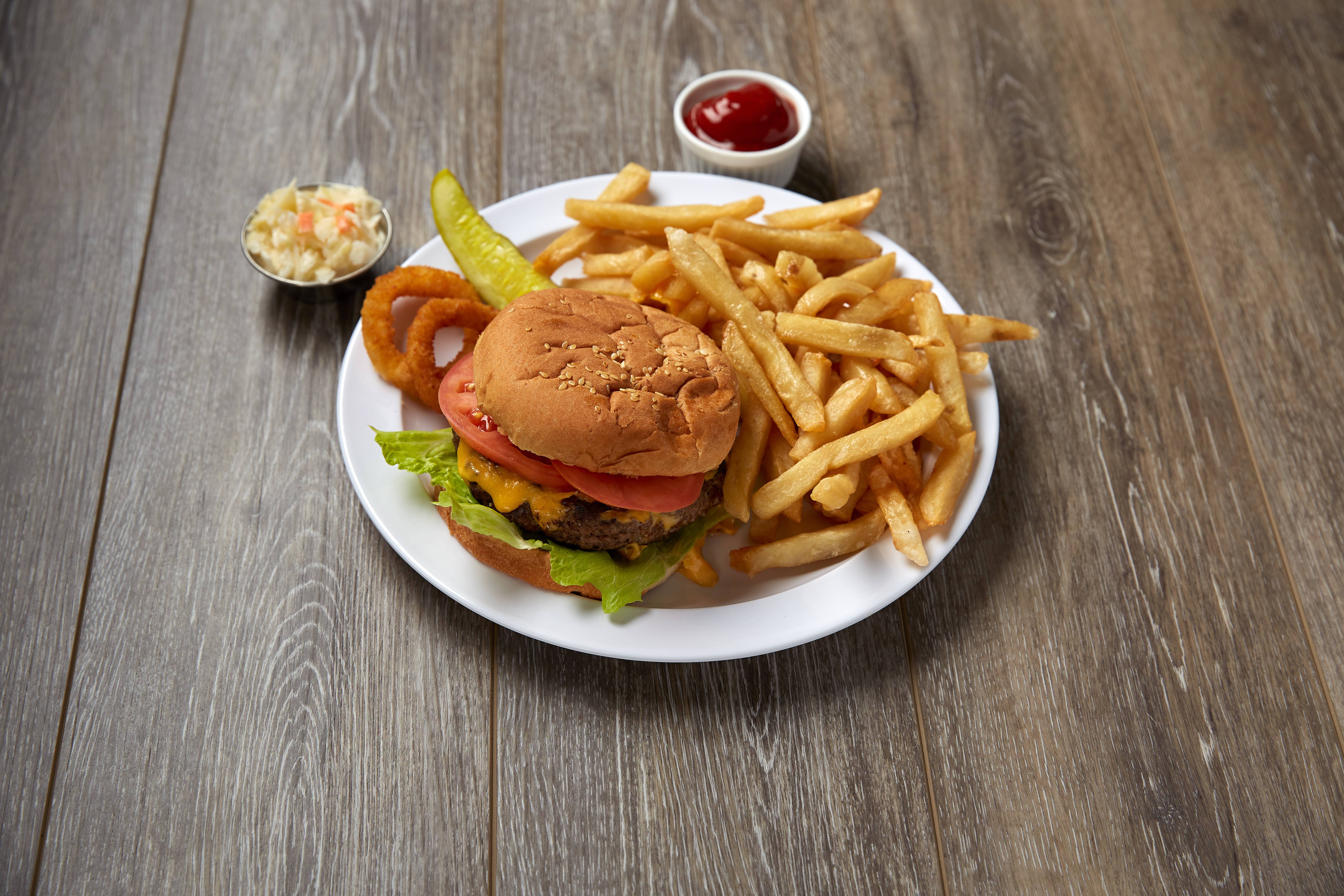 Order Cheeseburger Deluxe food online from Happy Days Diner store, Brooklyn on bringmethat.com