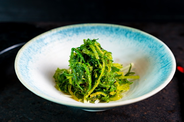 Order Wafu Seaweed Salad food online from Kinha Sushi store, Garden City on bringmethat.com