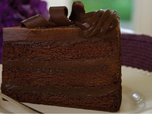 Order Gourmet Chocolate 3 Layer Cake food online from Cheesecake Royale Bakery store, Dallas on bringmethat.com