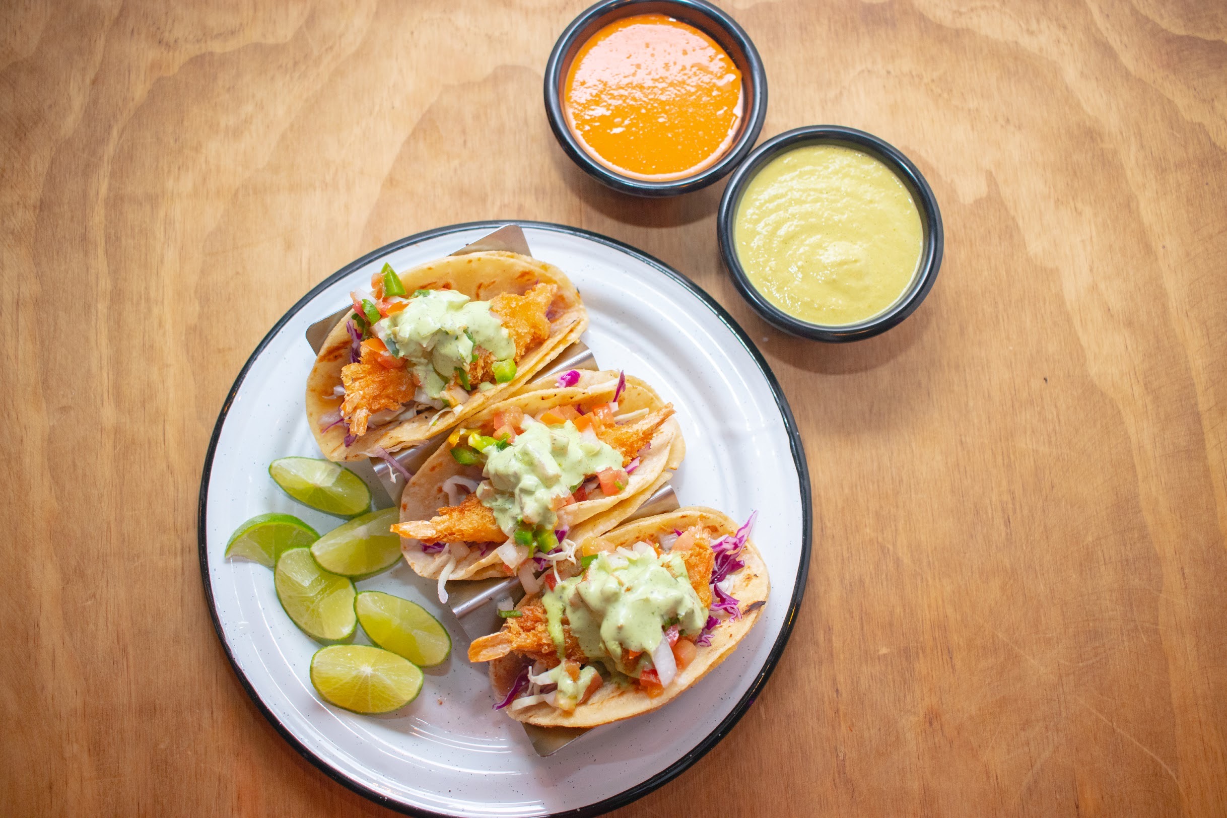 Order Baja Fish or Shrimp Tacos food online from Adrian`s Tacos California store, Katy on bringmethat.com