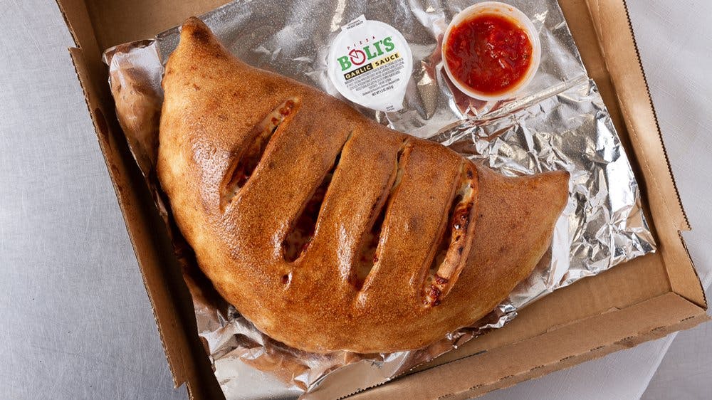 Order Meatster Stromboli - 12" (Serves 2 People) food online from Pizza Bolis store, Gainesville on bringmethat.com