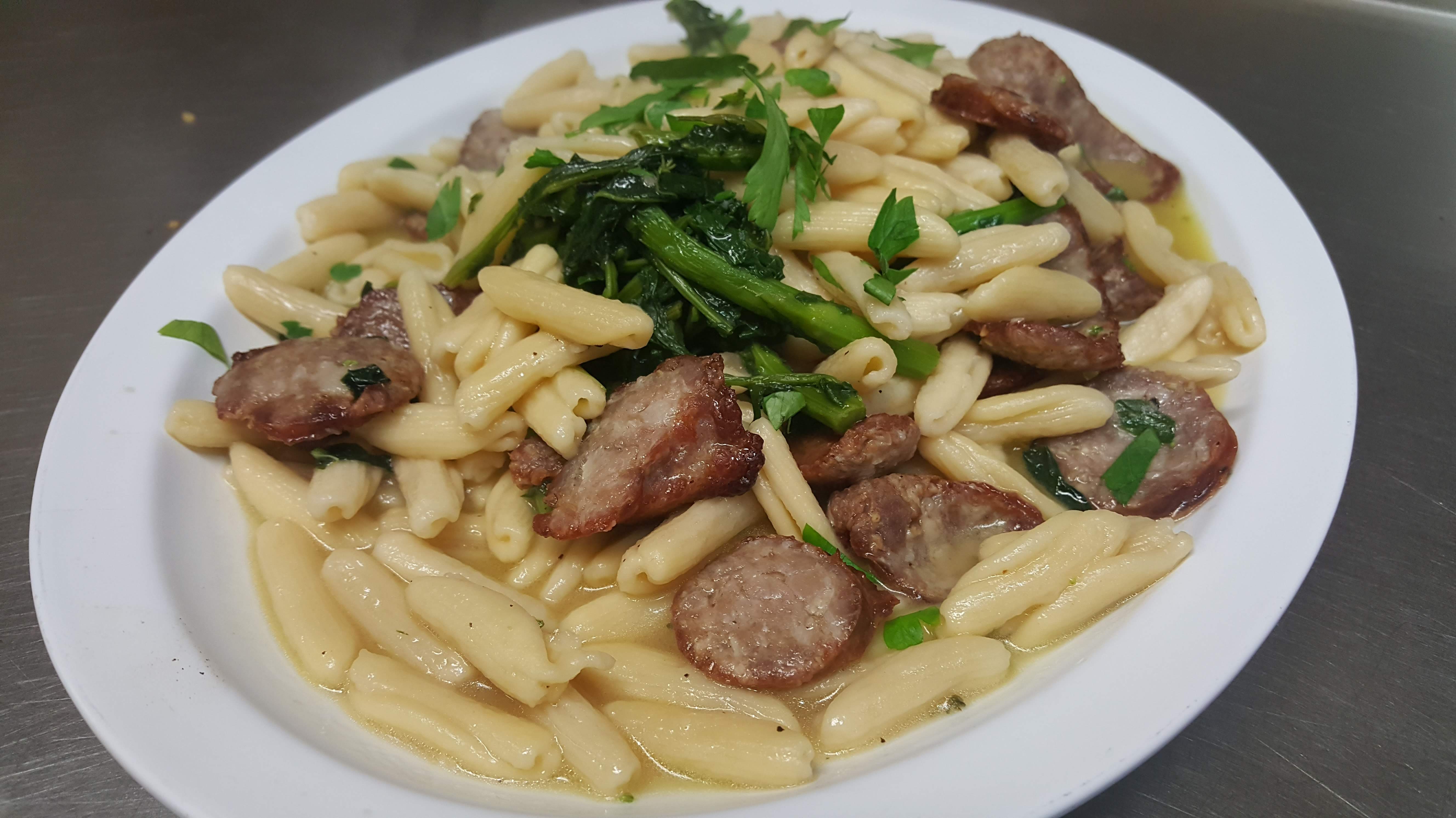 Order Cavatelli with broccoli rabe and sausage food online from Pizzarelli's Pizza store, Scarsdale on bringmethat.com