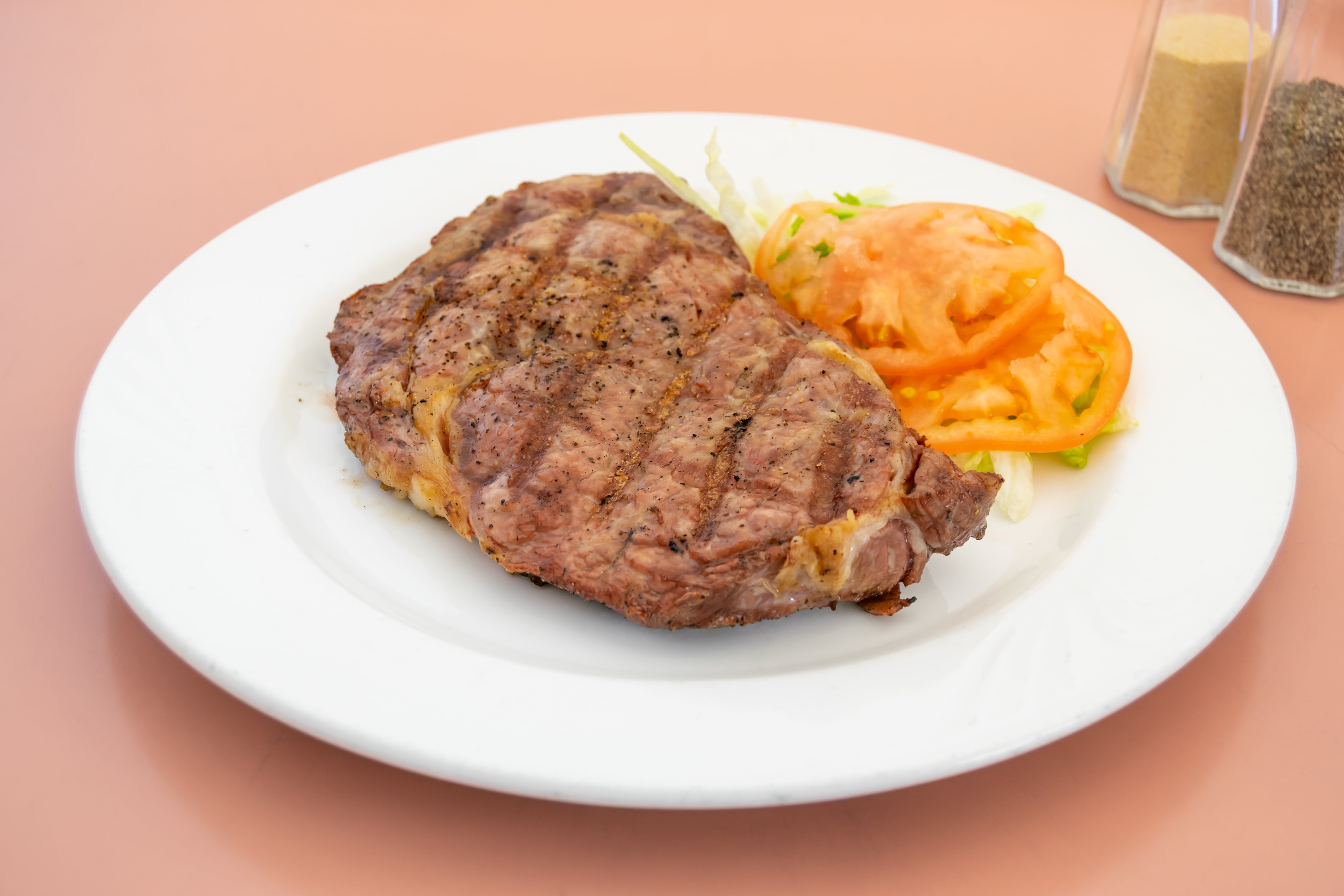 Order New York Strip Steak - 16 oz. food online from Angelo's Pizza store, Bloomfield on bringmethat.com