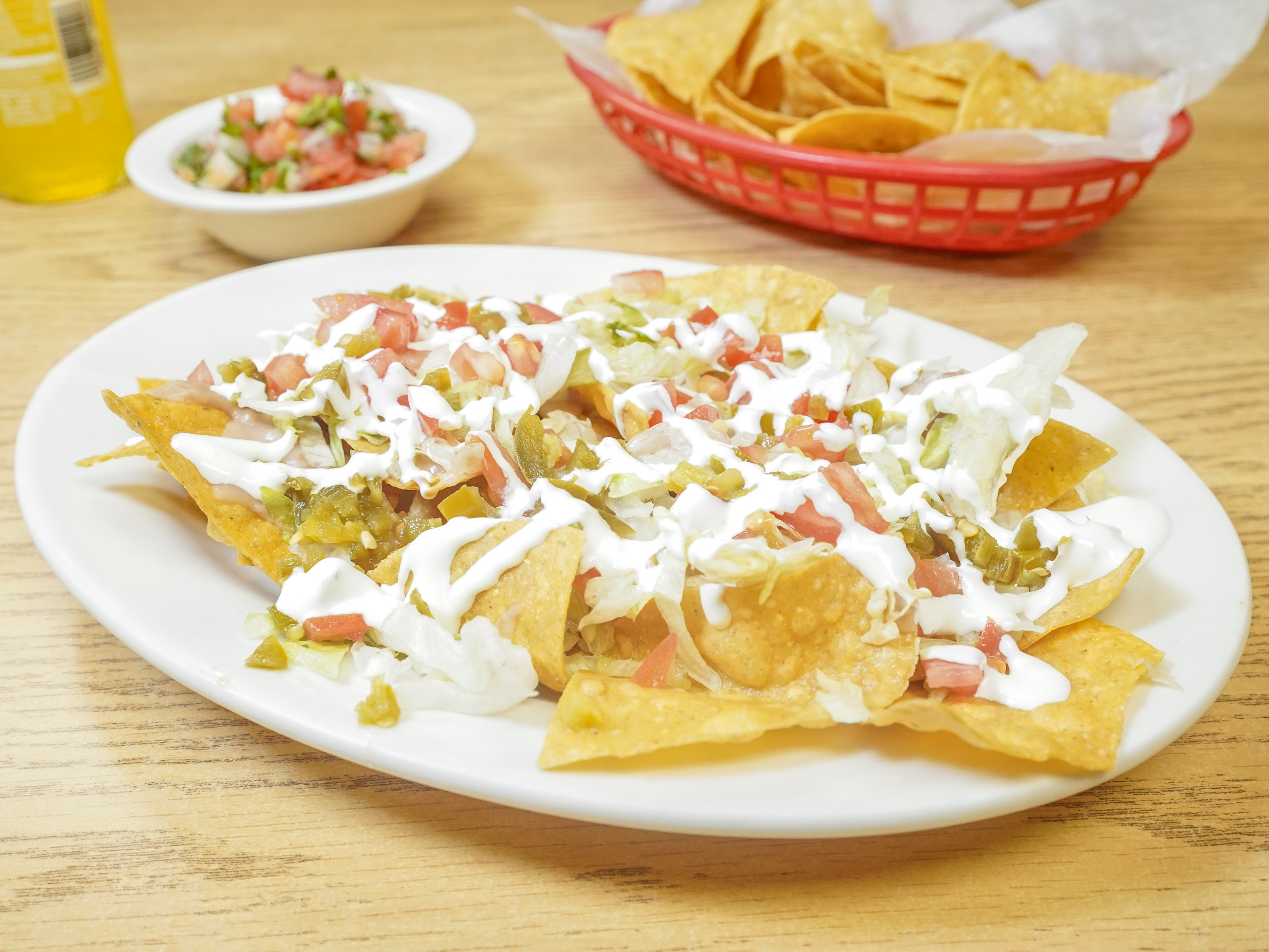 Order Nachos with Chicken food online from La Casita Mexican store, Green Cove Springs on bringmethat.com