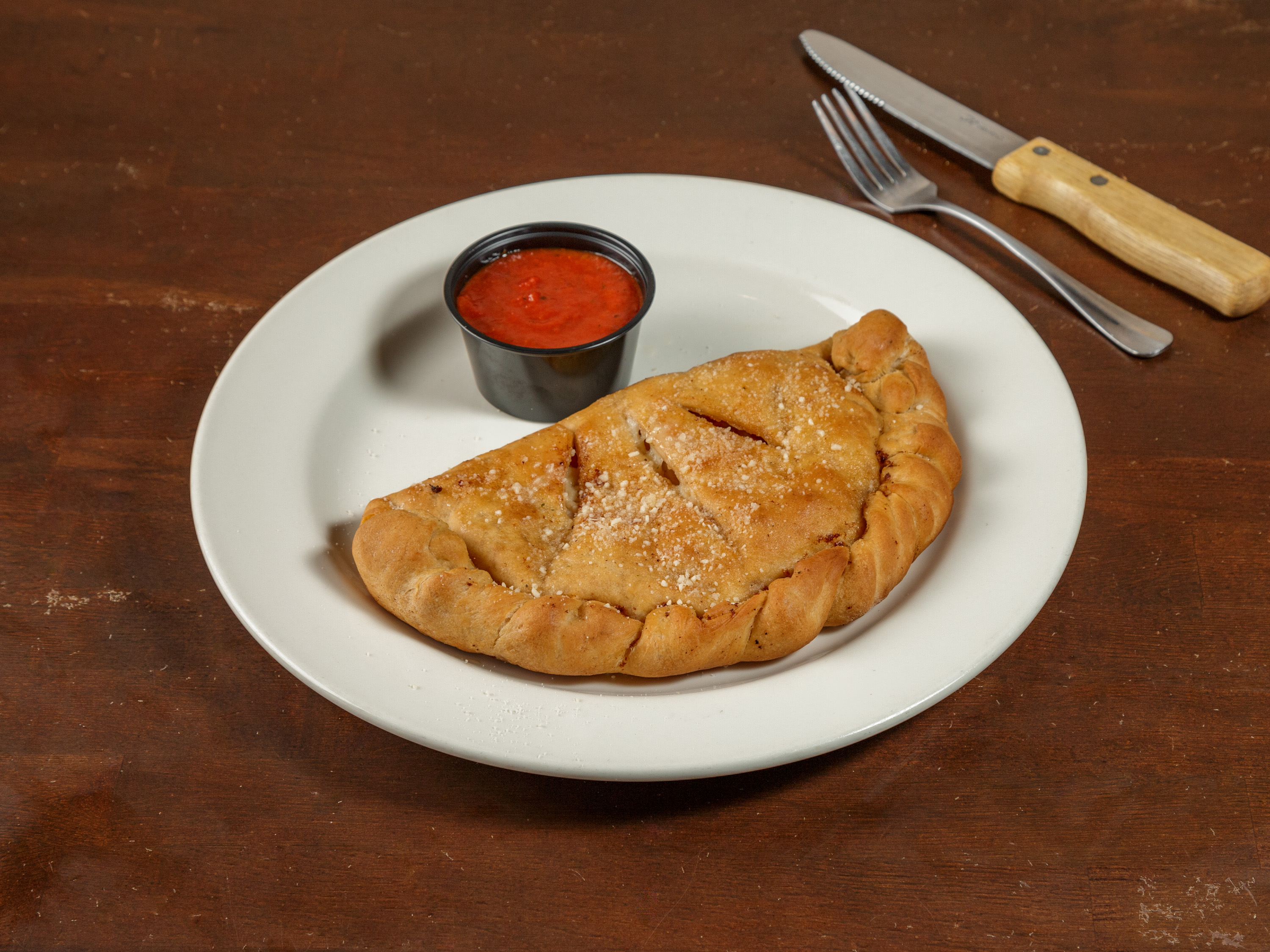 Order All Meat Calzone food online from Pipeline Pizza store, Pasadena on bringmethat.com