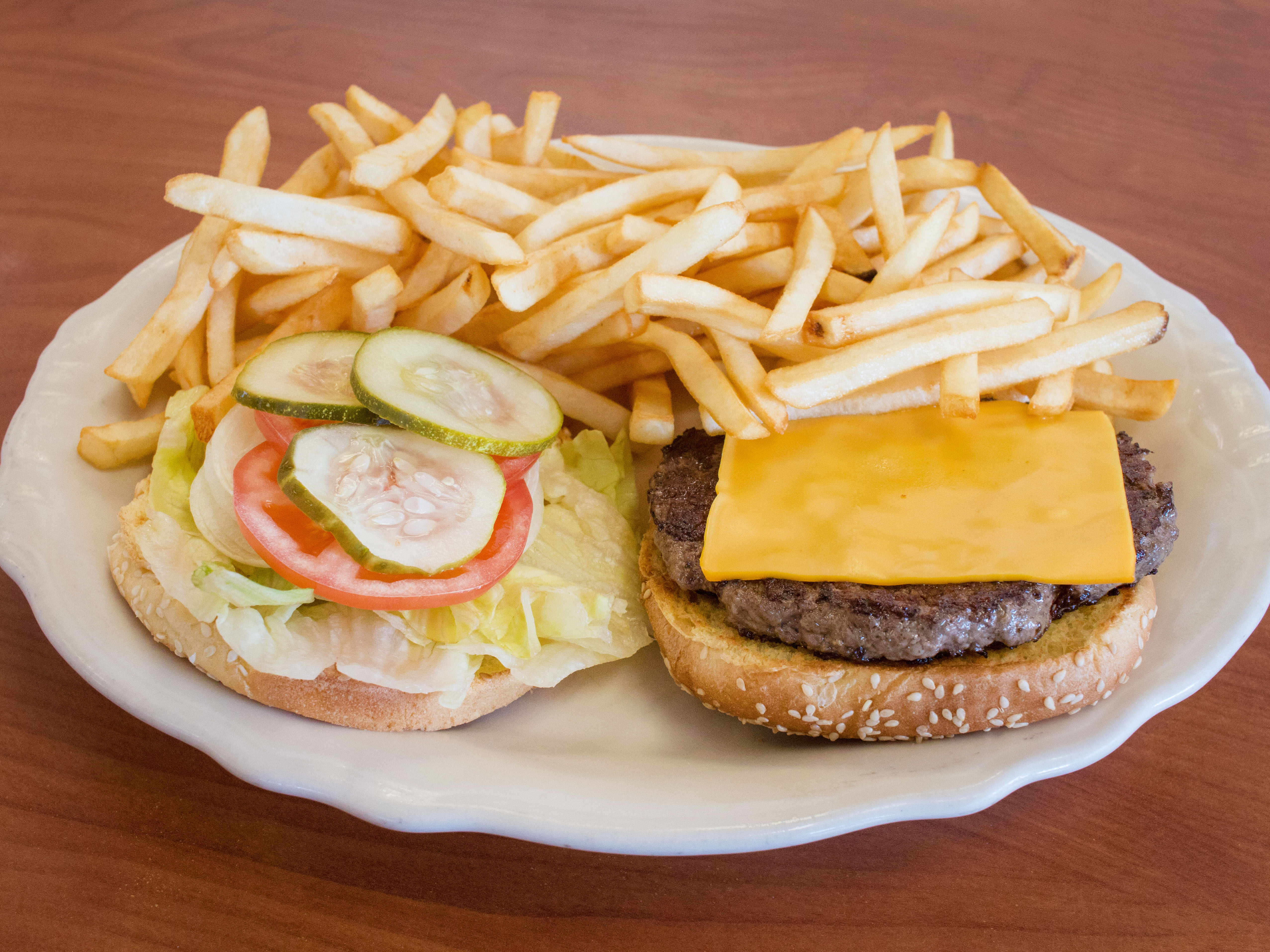 Order Cheeseburger Deluxe food online from Olympic Grill store, Center Line on bringmethat.com