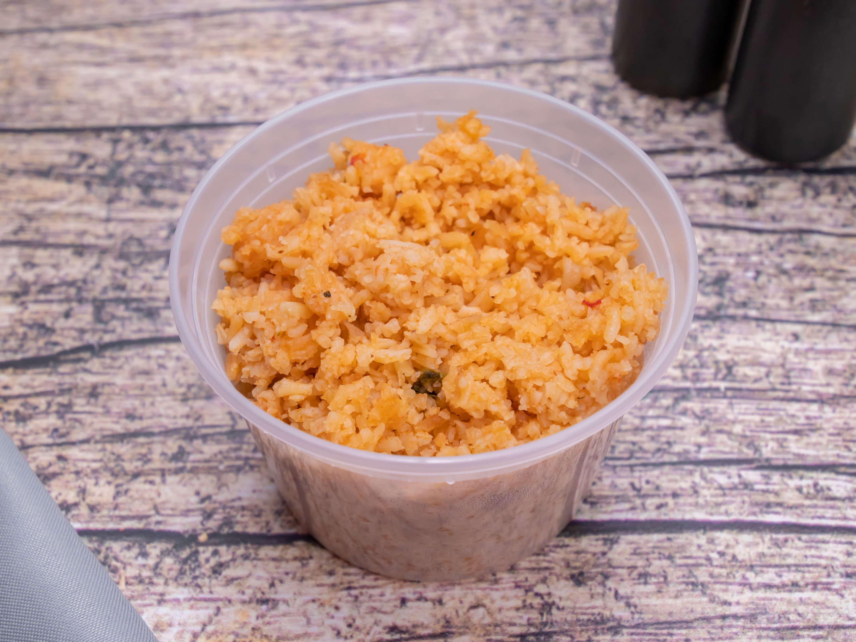 Order Rice 6 oz. food online from Lil Kikos Taqueria store, Dacula on bringmethat.com