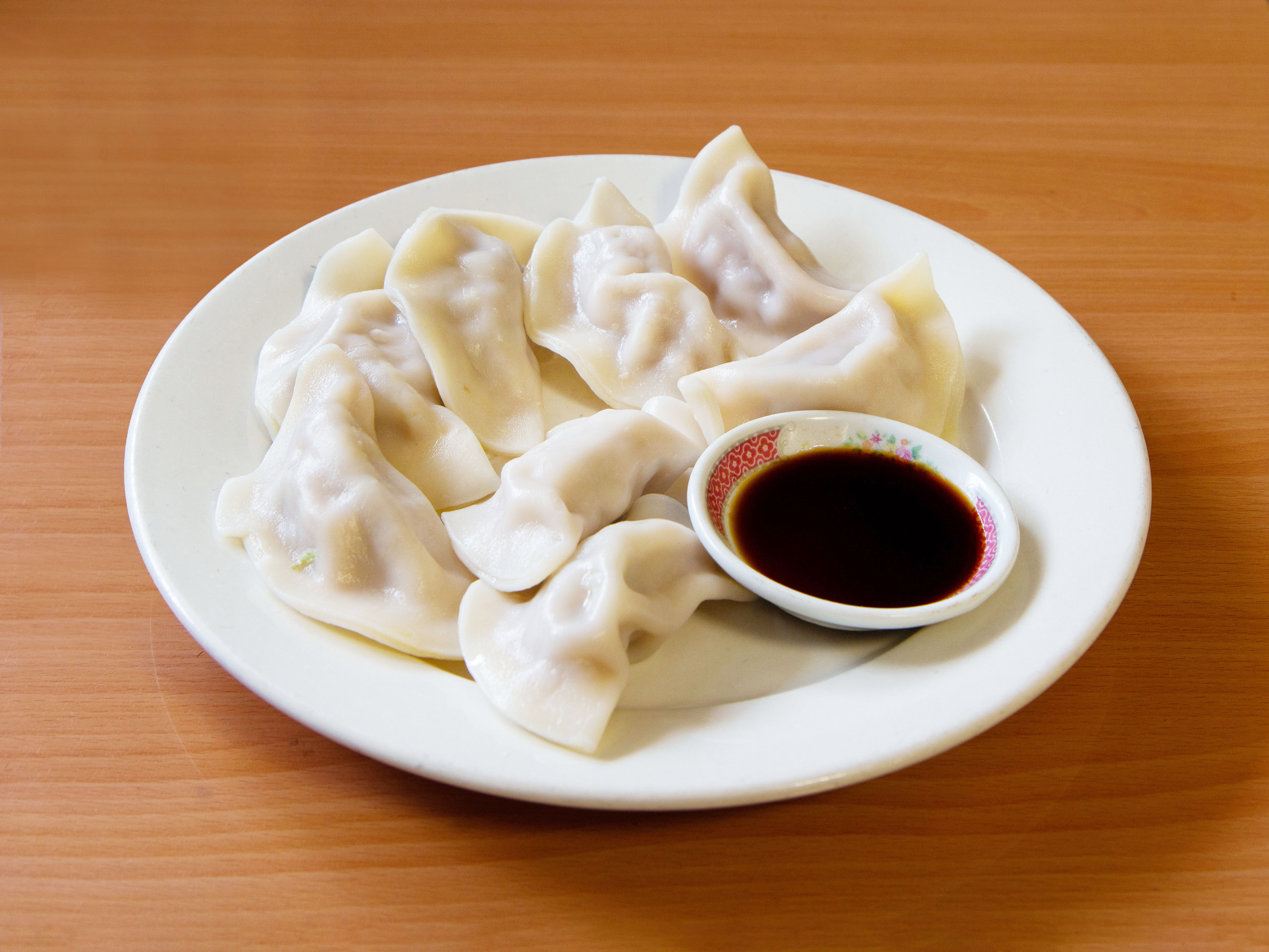 Order 3. Fried Chicken Dumplings food online from China Express store, Newark on bringmethat.com