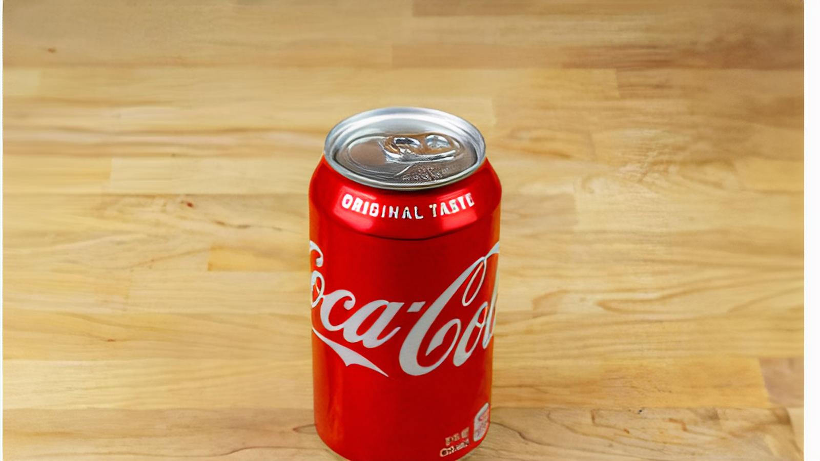 Order Soda (can) food online from Toto's Pizzeria & Restaurant store, Belmont on bringmethat.com