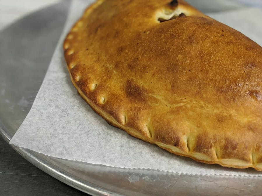 Order Lucino's Calzone - Medium food online from Lucino Pizza store, Las Vegas on bringmethat.com
