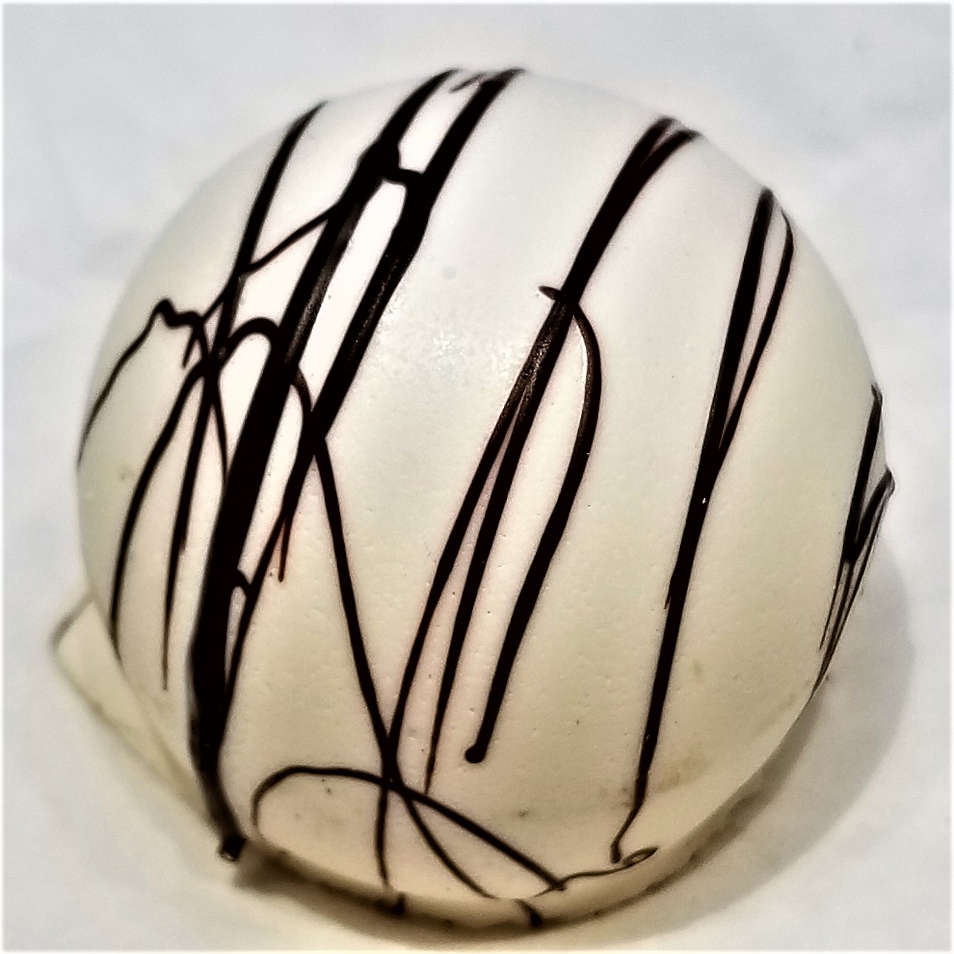 Order Champagne Truffle food online from Rocky Mountain Chocolate Factory store, Tempe on bringmethat.com