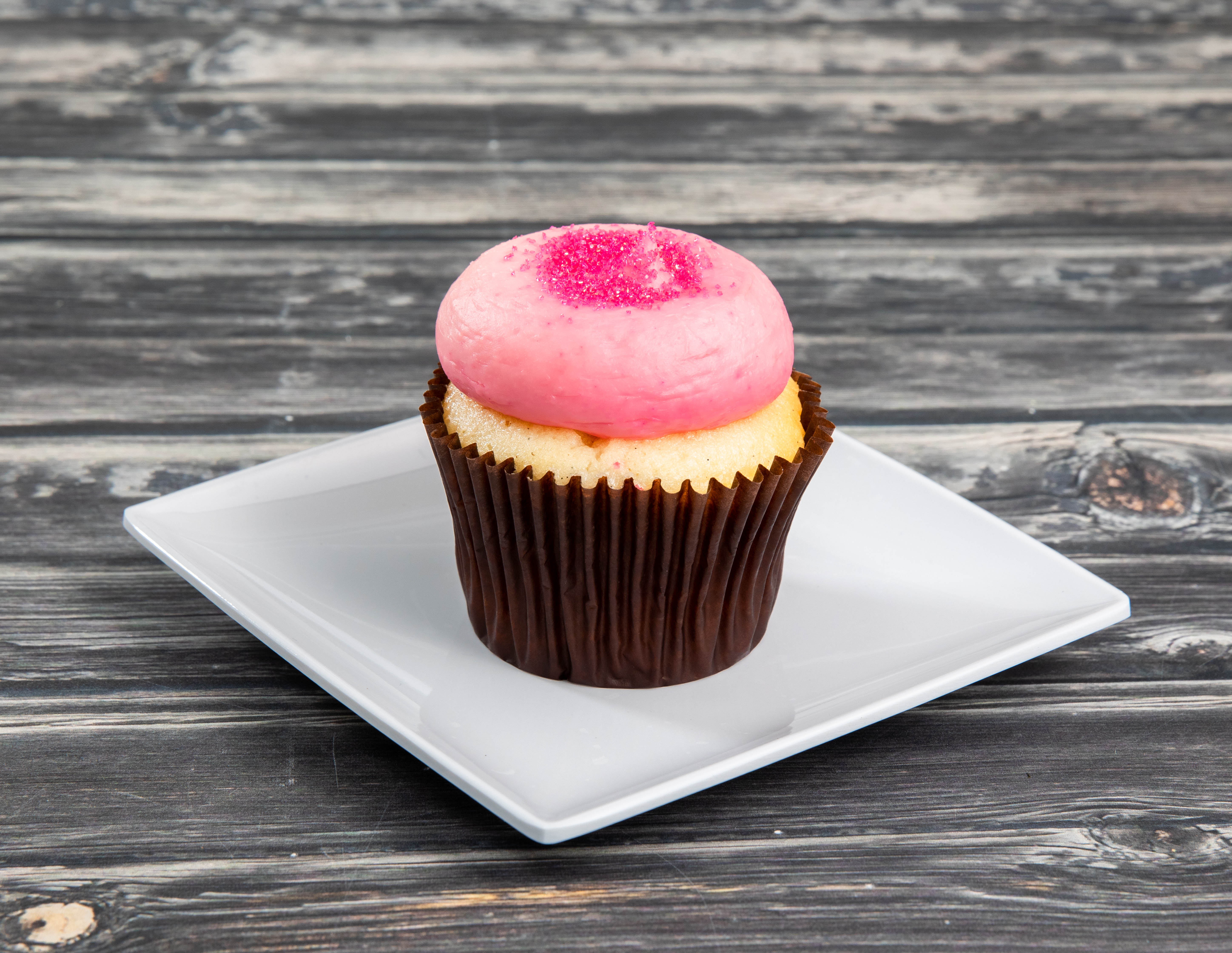Order Pink Vanilla Cupcake food online from Smallcakes Cupcakery & Creamery - Waco store, Waco on bringmethat.com