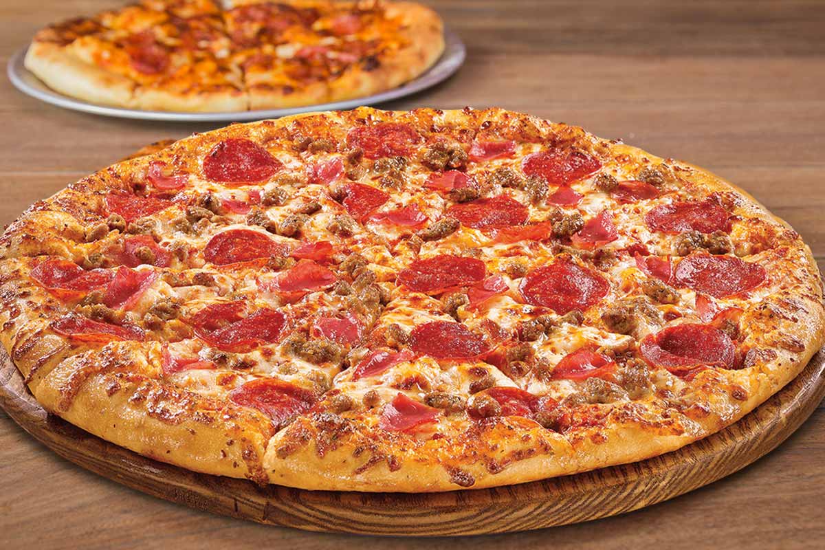 Order Meat Lovers Pizza food online from Spartan Pizzeria store, Baltimore on bringmethat.com
