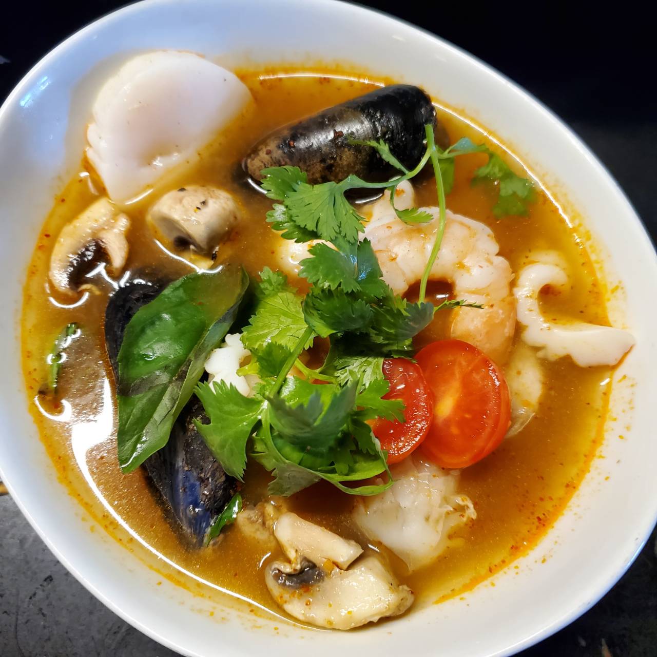 Order Seafood Tom Yum food online from Orchid Thai Restaurant & Bar store, Falmouth on bringmethat.com