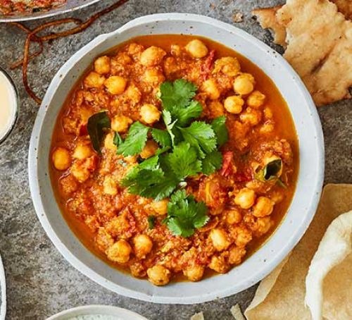 Order Chana Masala food online from Swad Indian and Nepalese Cousine store, Fort Worth on bringmethat.com