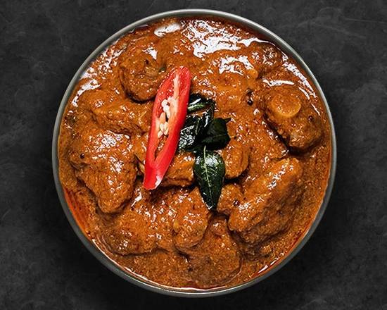 Order United Goat Curry food online from United Kitchens Of India store, Huntsville on bringmethat.com