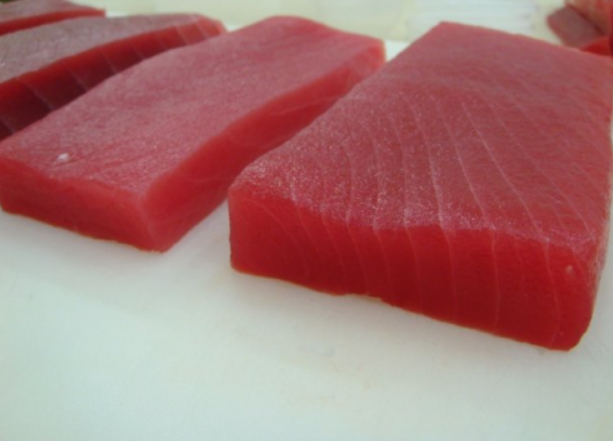 Order 8 oz. Frozen Tuna Saku Block food online from Dixon Seafood Shoppe store, Peoria on bringmethat.com