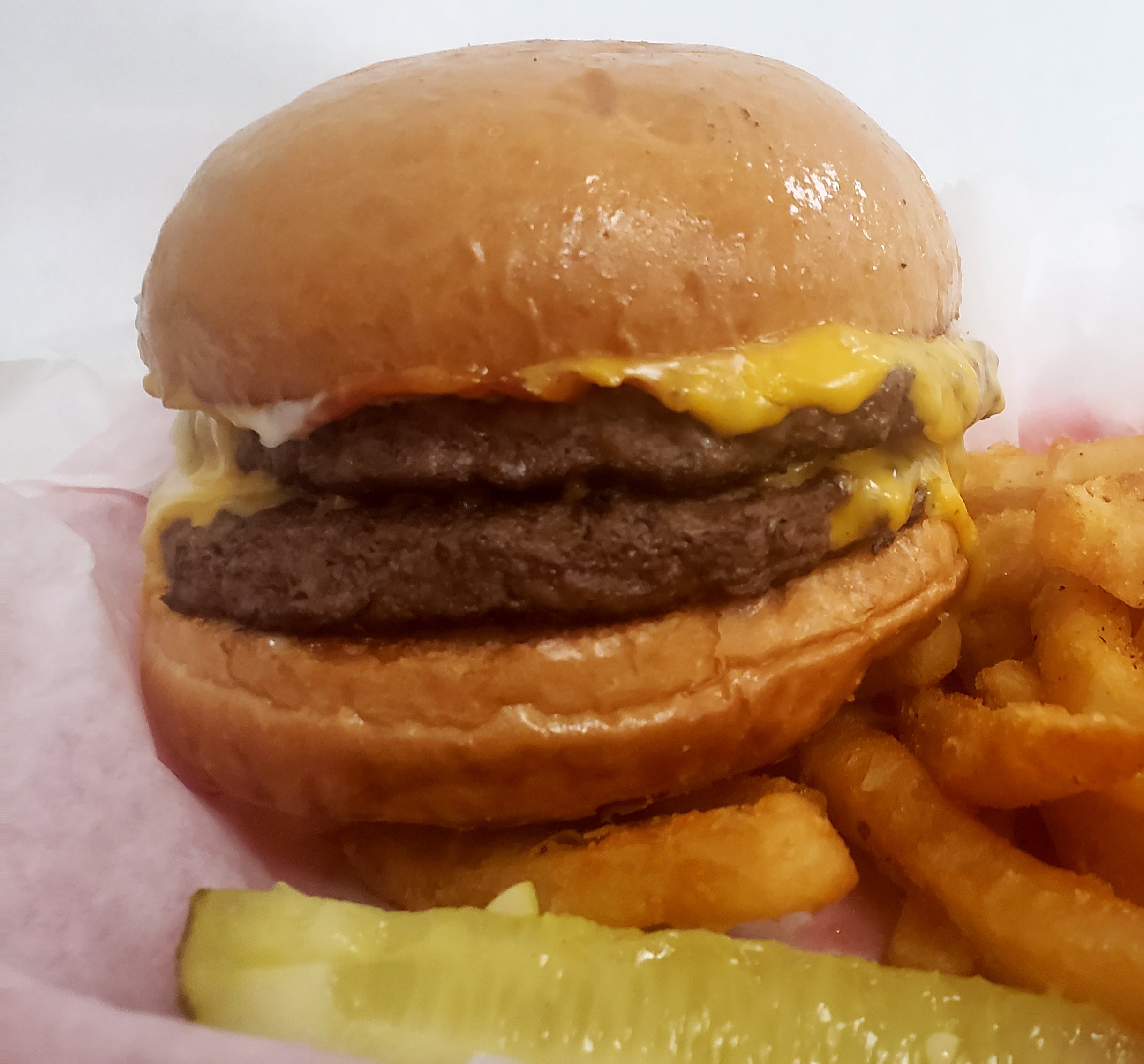 Order Double Cheeseburger - Burger food online from Chubbys Cheesesteaks store, Milwaukee on bringmethat.com