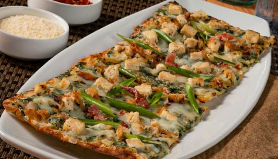 Order Chicken, Spinach & Bacon Flatbread - Appetizer food online from Bravo! Cucina Italiana store, Canton on bringmethat.com