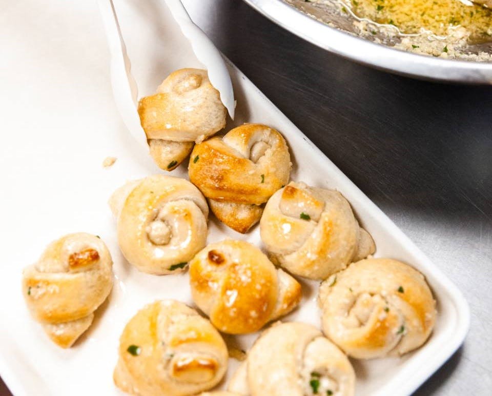 Order Garlic Knots - 6 Pieces food online from Planet Pizza store, Shelton on bringmethat.com