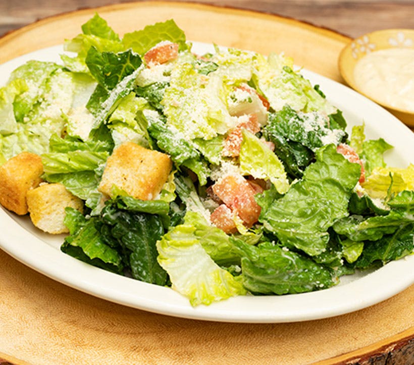 Order Classic Caesar Salad - Salad food online from Papazzi Pizzeria store, Bellevue on bringmethat.com