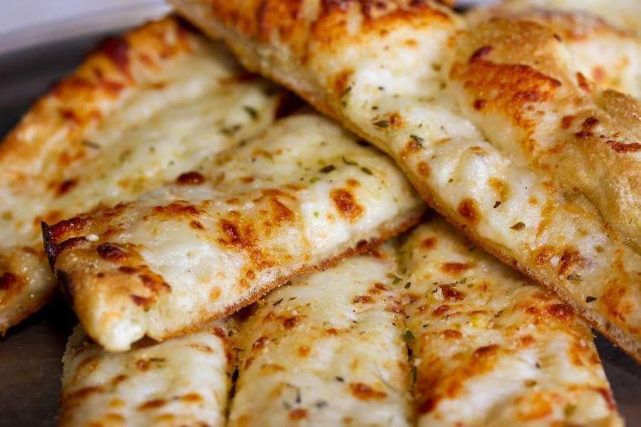Order Cheese Bread Sticks food online from Illianos Pizza store, Clemmons on bringmethat.com