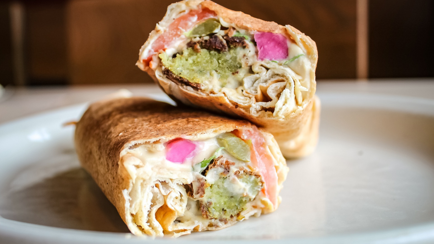 Order Hummus Falafel Rolled food online from Aladdins eatery store, Akron on bringmethat.com