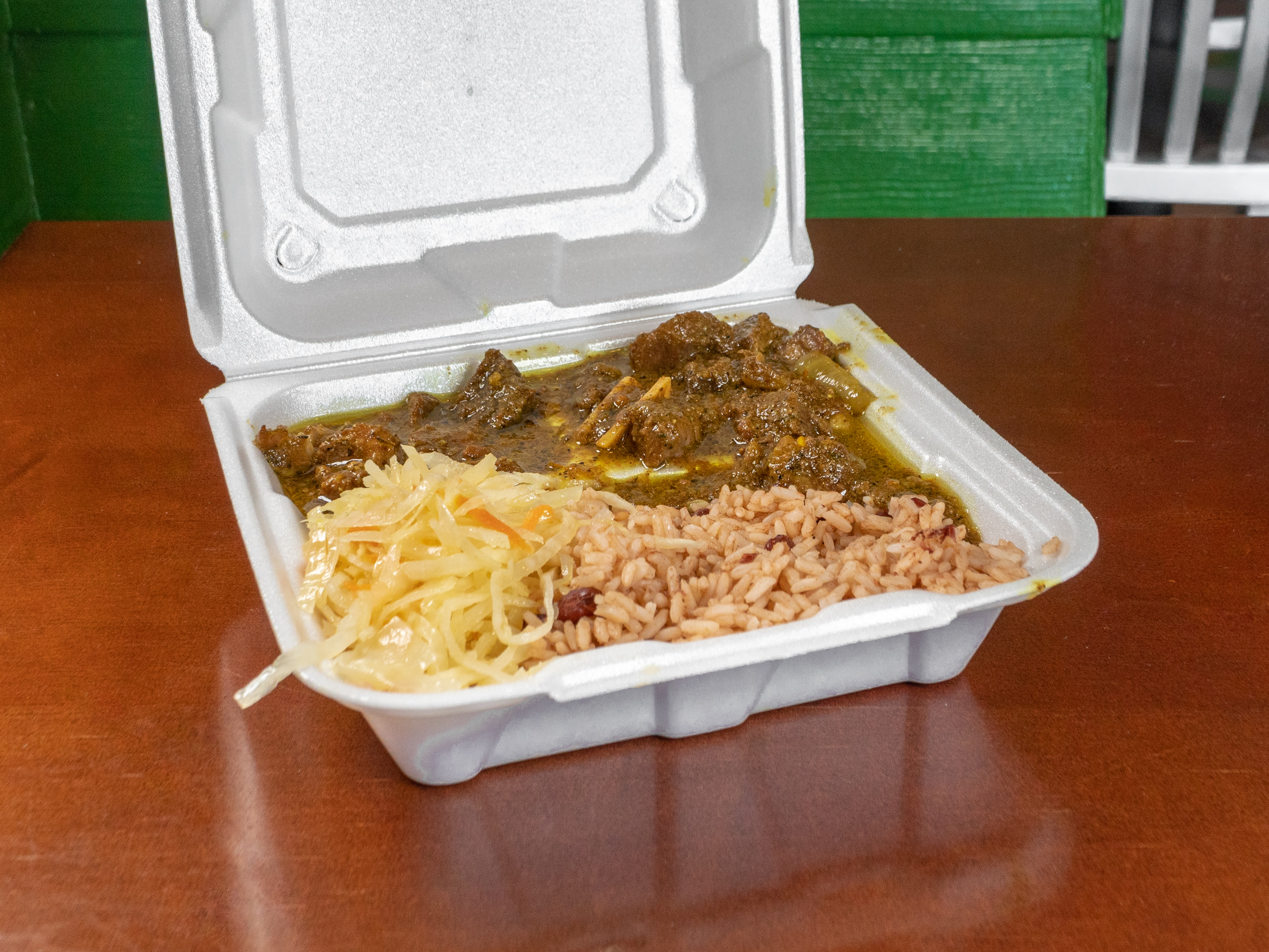 Order Oxtail & Curry Goat Combo food online from Caribbean Plate store, Falls Church on bringmethat.com