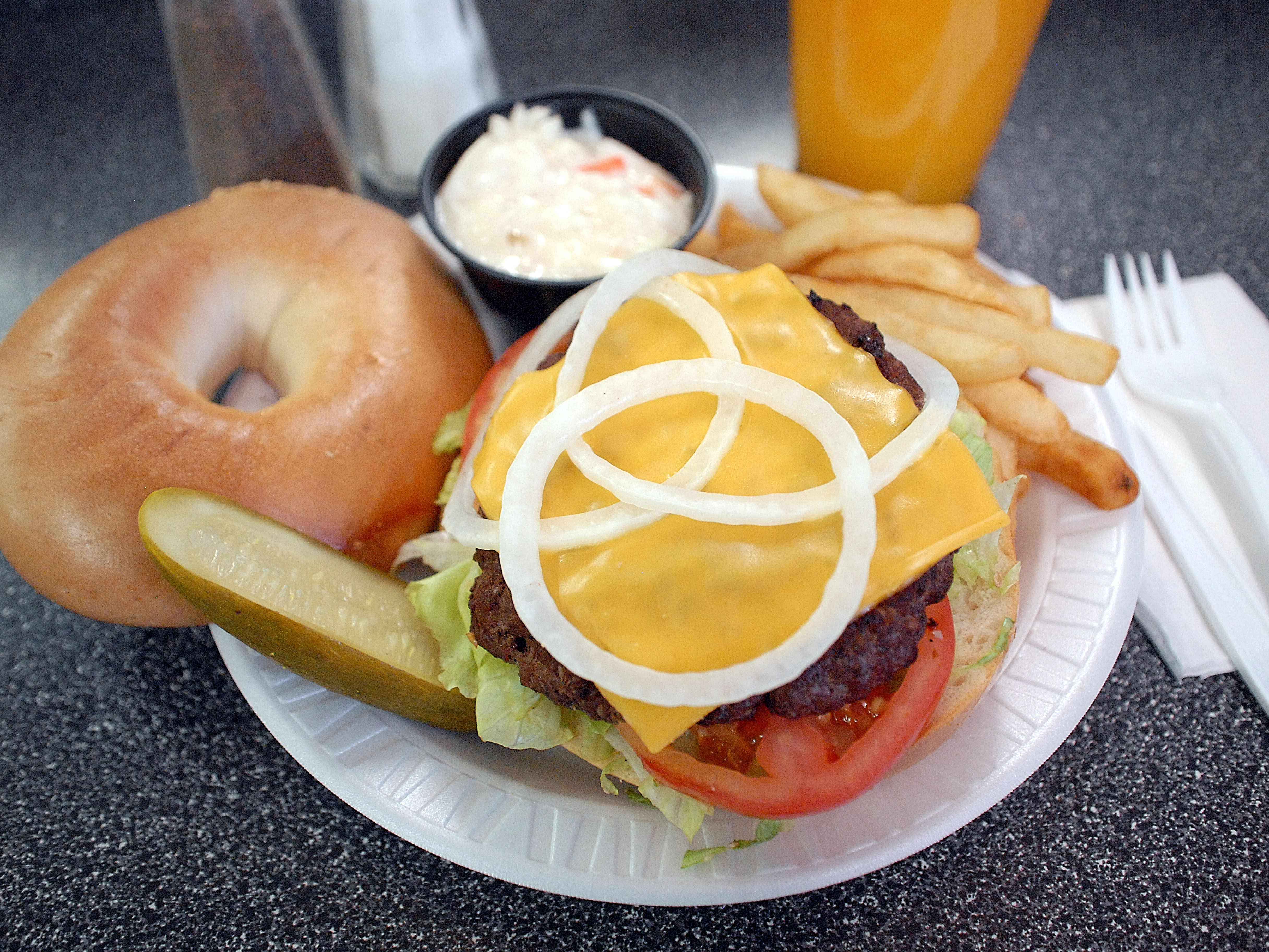 Order 2. 8 oz. Cheeseburger Deluxe Lunch food online from New York Bagel Cafe & Deli store, Haledon on bringmethat.com